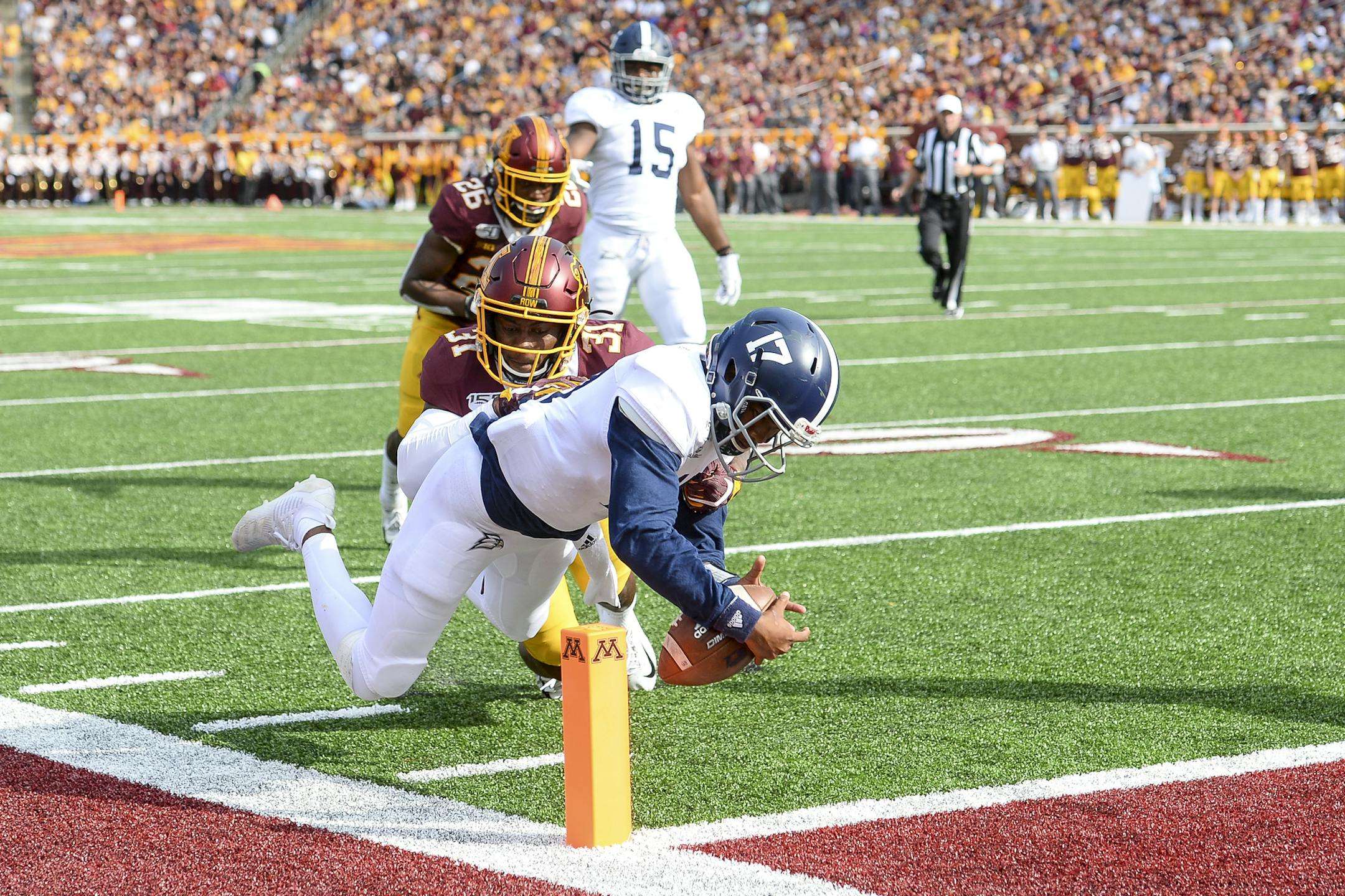 Georgia Southern Eagles quarterback Justin Tomlin (17) ran the ball in for a touchdown with Gophers defensive back Kiondre Thomas (31) in pursuit in the final minute of the first half. ] Aaron Lavinsky • aaron.lavinsky@startribune.com The Gophers played Georgia Southern on Saturday, Sept. 14, 2019 at TCF Bank Stadium in Minneapolis, Minn.