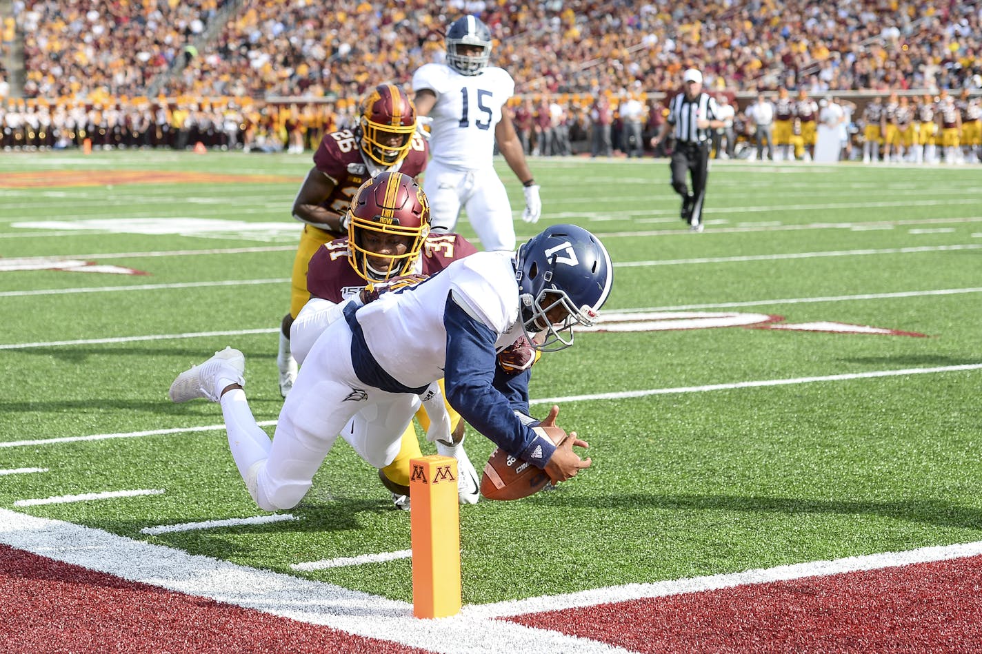 Georgia Southern Eagles quarterback Justin Tomlin (17) ran the ball in for a touchdown with Gophers defensive back Kiondre Thomas (31) in pursuit in the final minute of the first half. ] Aaron Lavinsky &#x2022; aaron.lavinsky@startribune.com The Gophers played Georgia Southern on Saturday, Sept. 14, 2019 at TCF Bank Stadium in Minneapolis, Minn.