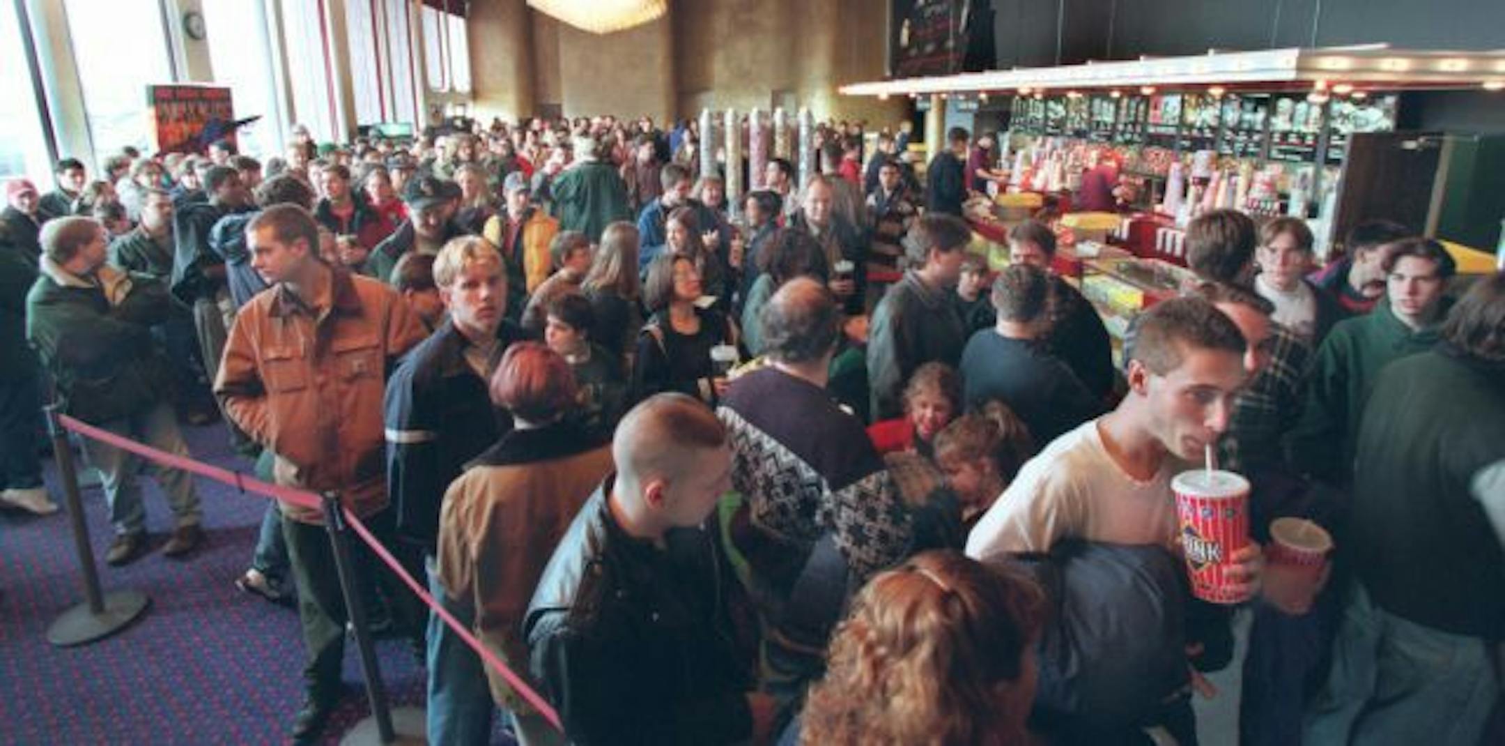 -- 1st day of the re-release of Star Wars. The Har Mar Theaters lobby was packed for the 4 pm showing of the Star Wars. The theatre sold out all the days performances including the 12:15 am show, early Friday afternoon.