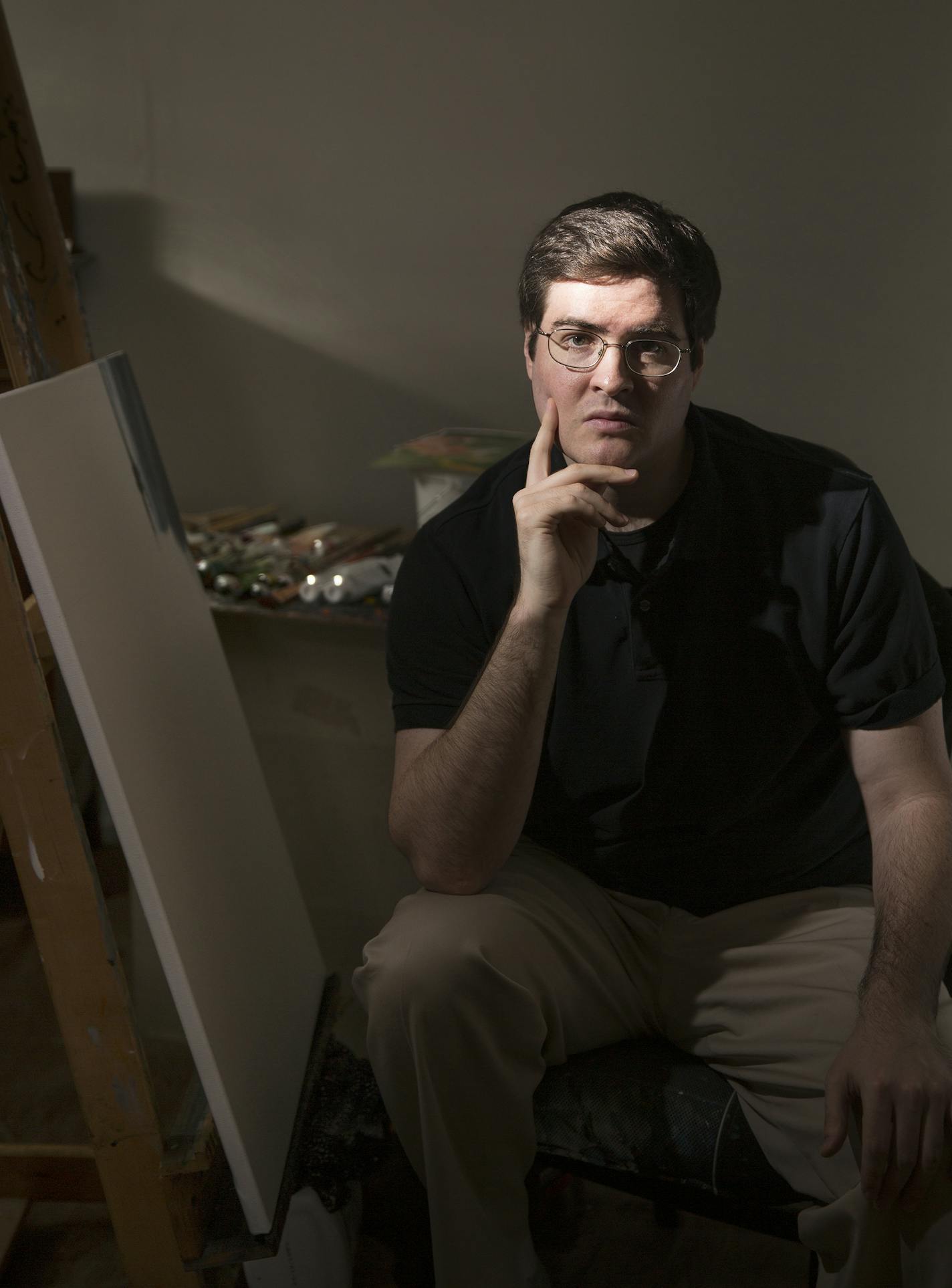 Local artist Rowan Pope inside his home studio in St. Paul. ] LEILA NAVIDI leila.navidi@startribune.com / BACKGROUND INFORMATION: Friday, January 30, 2015. Rowan Pope, in collaboration with Breck Middle School, wrote the book "Six Chairs: A Holocaust Survivor's Story" which was illustrated by Breck Middle School students about local Holocaust survivor Joe Grosnacht.