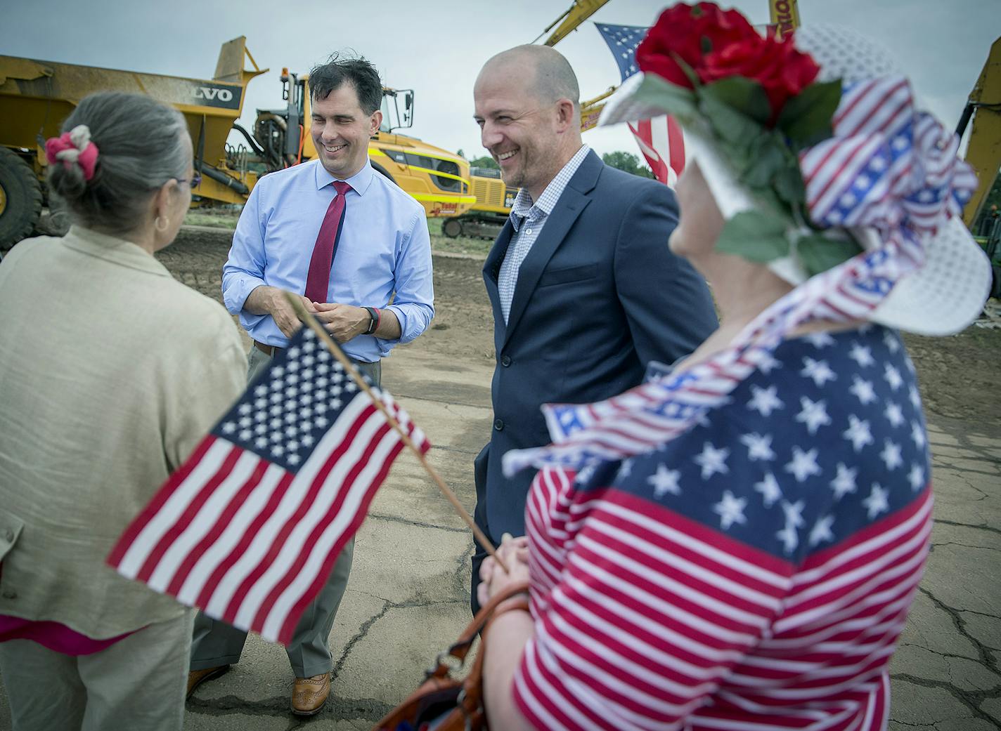 Wisconsin Governor Scott Walker, left, and developer Klint Klass, center, greeted supporters after he announced a $500,000 state grant to support the demolition project of the long-dormant St. Croix Meadows dog racing track during a press conference at the site, Tuesday, July 3, 2018 in Hudson, Wis. ] ELIZABETH FLORES &#xef; liz.flores@startribune.com