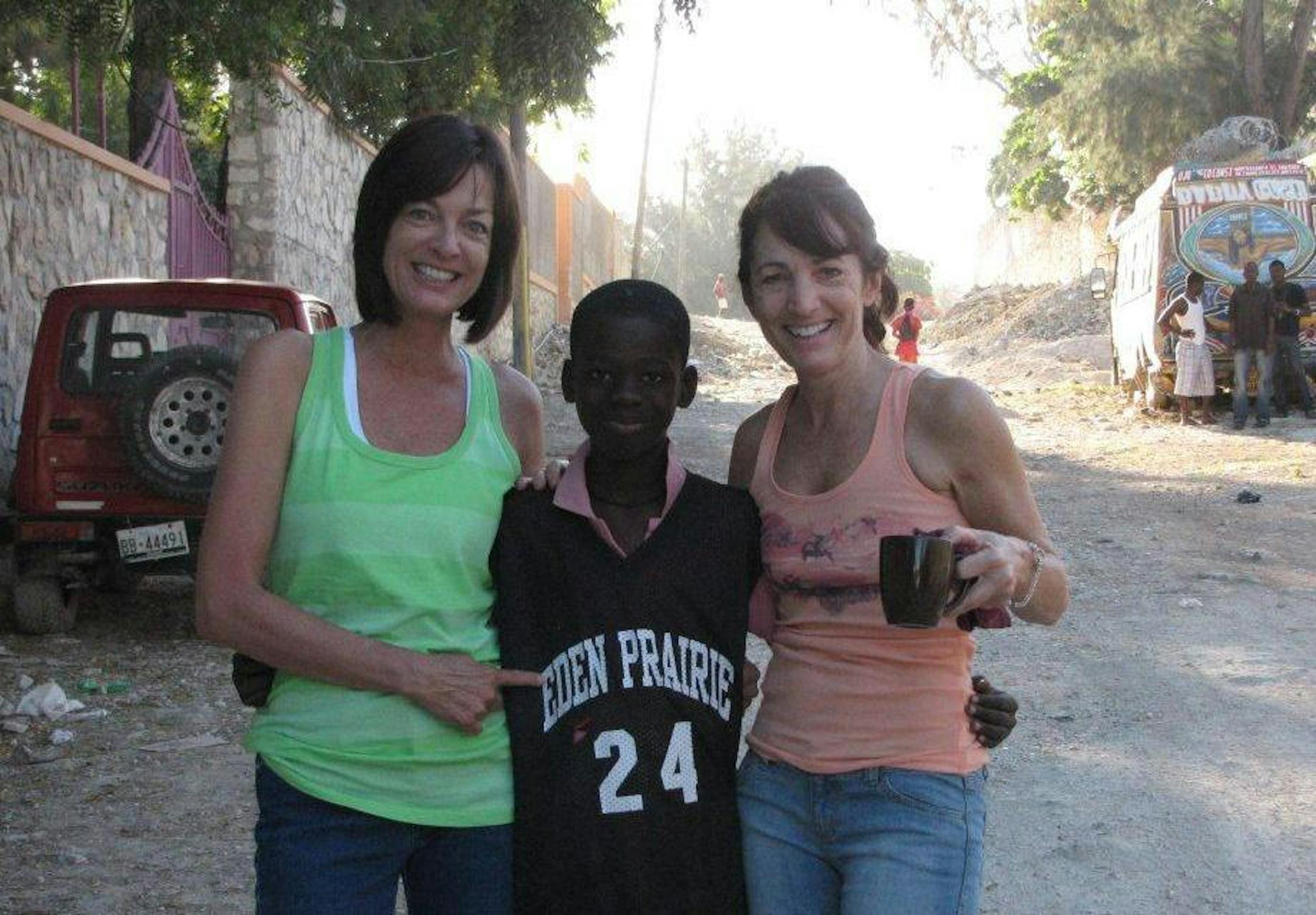 Ann Brau and Joyce Getchell, sisters from the Twin Cities, have carried on the work in Haiti of their uncle, the late Rev. Reiser. Brau is from Eden Prairie, a connection she noted in this young boy's apparel.
