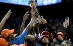 Lynx players hoisted the WNBA championship trophy above their heads Wednesday.