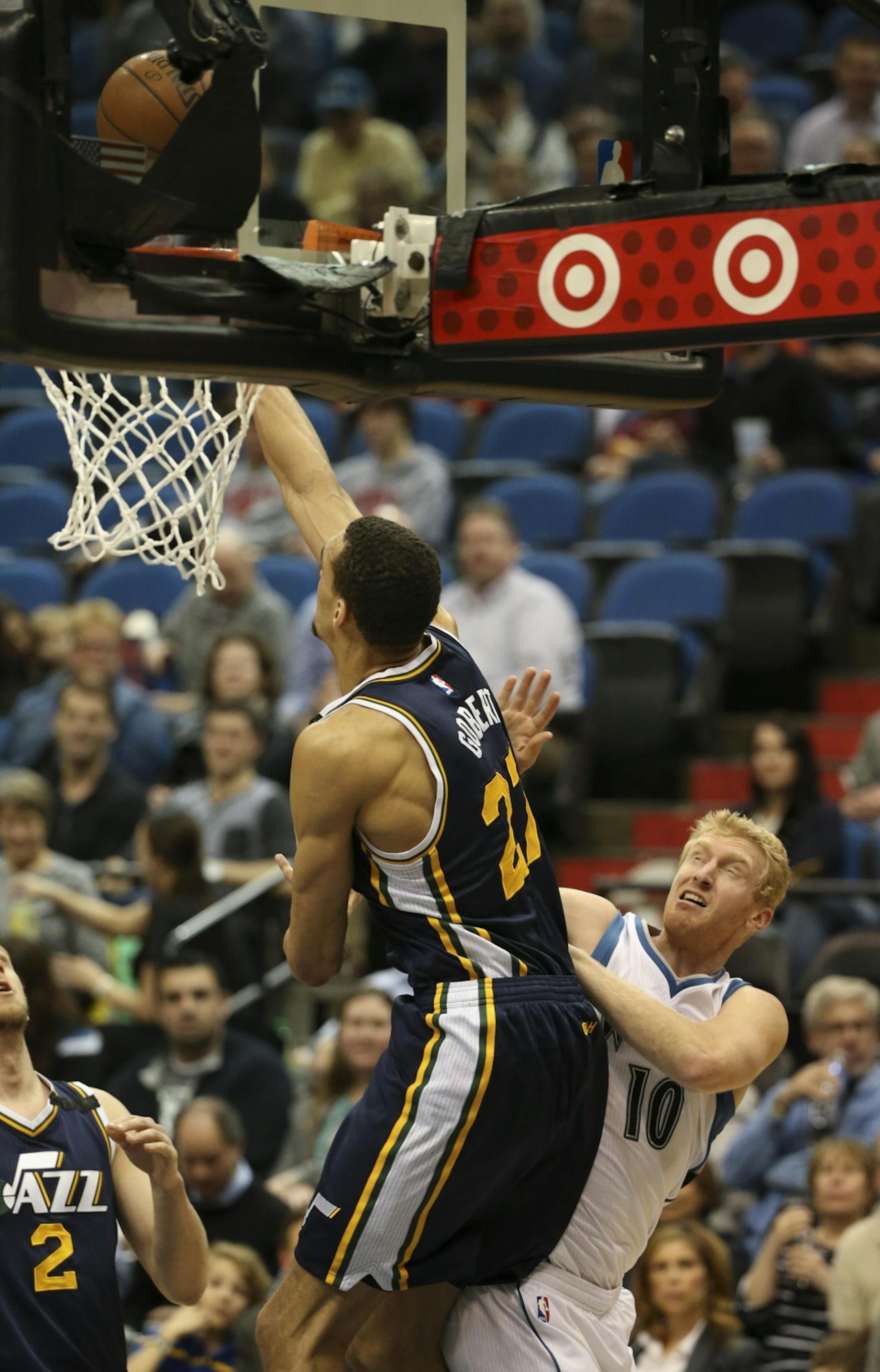 Utah Jazz center Rudy Gobert pushed away a shot by Minnesota Timberwolves forward Chase Budinger in the first quarter Monday night at Target Center.