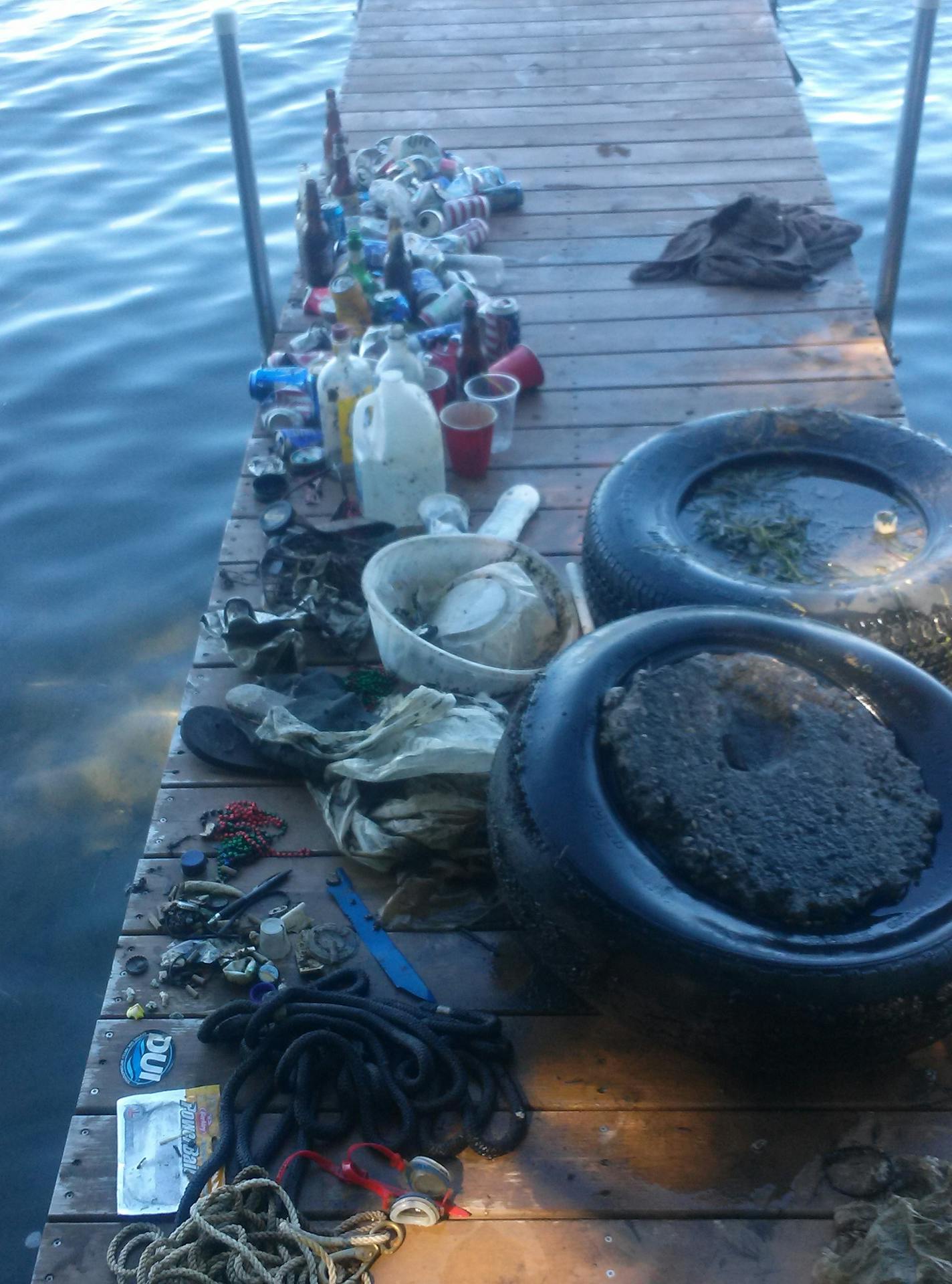 Submitted photos from Josh Leddy, owner of Life&#xed;s A Beach Shoreline Services, which volunteers to dive and pick up trash with volunteers from Tonka Bay Marina every other week in Lake Minnetonka near Big Island.