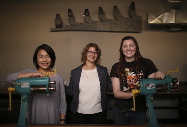 Melysia Cha, a construction management student, Maggie Whitman, Women&#xed;s Enrollment Coordinator, and Tovah Penning, an HVAC student, from left, ph