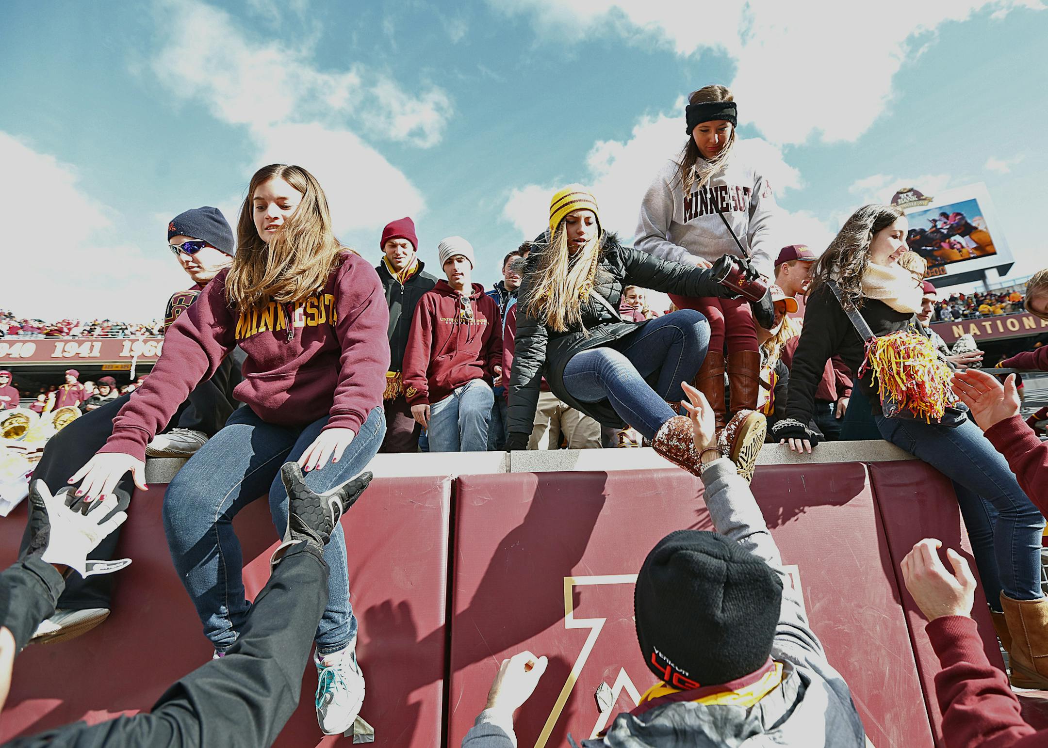 Fans jumped out of the stands and headed for the field after the game. ]JIM GEHRZ ‚Ä¢ jgehrz@startribune.com Minneapolis, MN / Oct 27, 2013, 11:00 AM BACKGROUND INFORMATION- The Minnesota Golden Gopher football team played the Nebraska Cornhuskers at TCF Bank Stadium. Minnesota won, 34-23.
