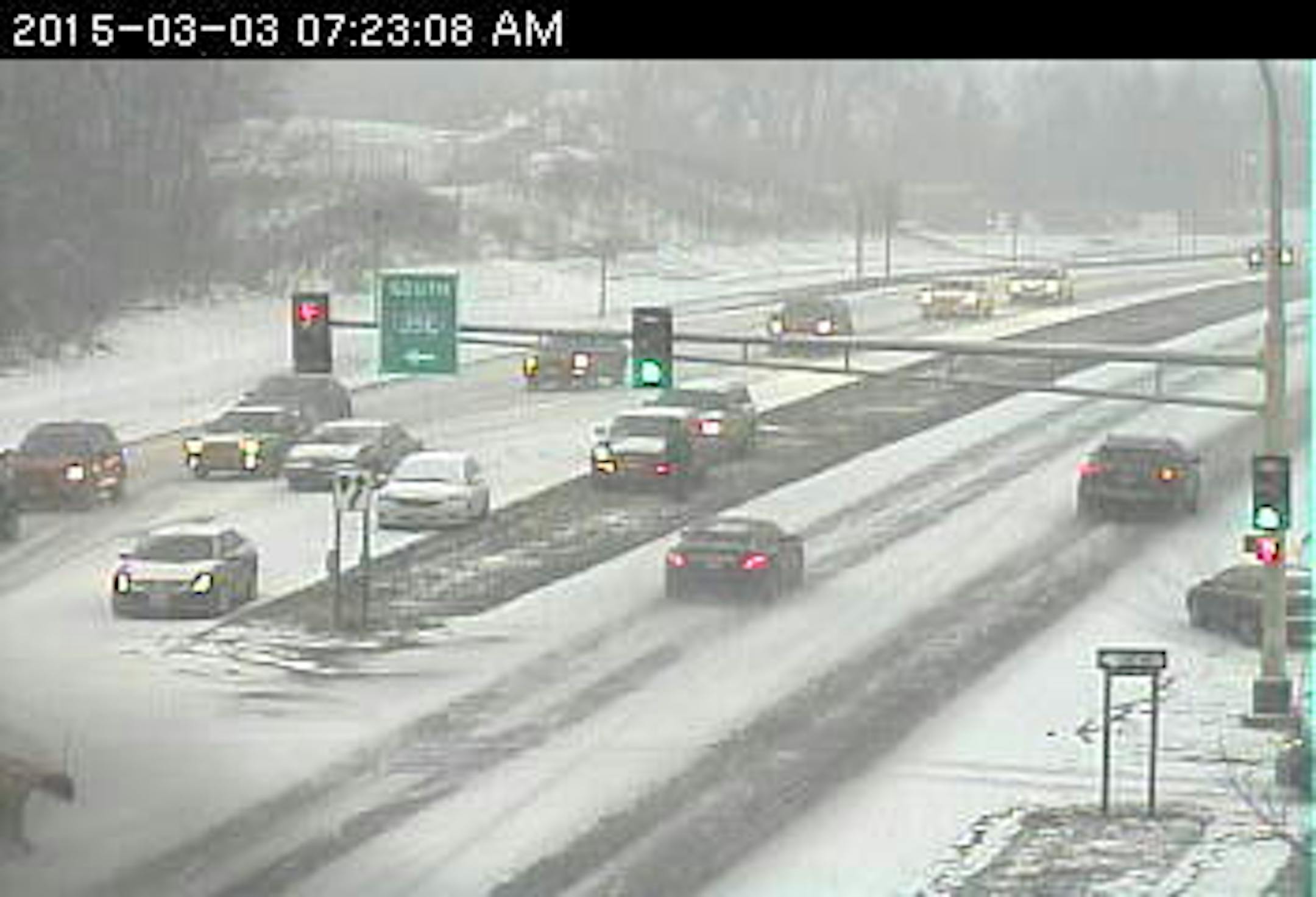 Snow fell Tuesday just in time to complicate the morning commute.