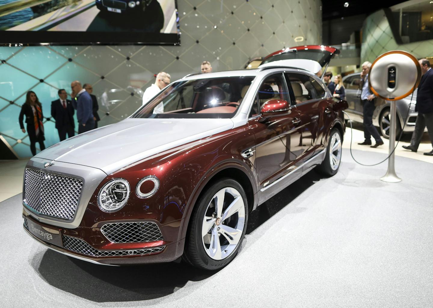 A plug-in power dock made from sustainable materials and designed by the French designer Philippe Starck stands next to the 2019 Bentley Bentayga hybrid luxury sports utility vehicle at the 88th Geneva International Motor Show in Geneva, Switzerland, on March 7, 2018. MUST CREDIT: Bloomberg photo by Chris Ratcliffe.