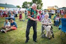 "Grandpa Bill" Kramer, 85, of Waconia, danced next to his wife, Judy, to music at Taste of Minnesota Thursday that is being held at the Carver County 