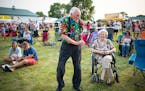 "Grandpa Bill" Kramer, 85, of Waconia, danced next to his wife, Judy, to music at Taste of Minnesota Thursday that is being held at the Carver County 