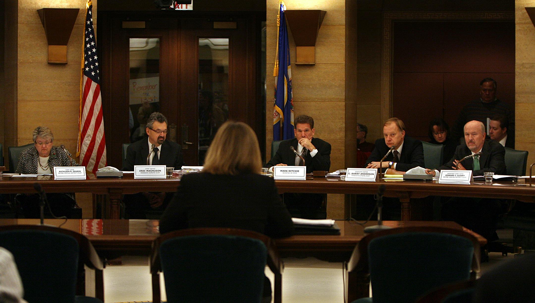 Minneapolis election director Cindy Reichert addressed members of the state Canvassing Board at the State Capitol on Friday morning. Members (l to r) are: Kathleen R. Gearin, Chief Judge, Second Judicial District; Eric J. Magnuson, Chief Justice, Minnesota Supreme Court; Mark Ritchie, Chair and Secretary of State; G. Barry Anderson, Associate Justice, Minnesota Supreme Court; and Edward J. Cleary, Assistant Chief Judge, Second Judicial District.