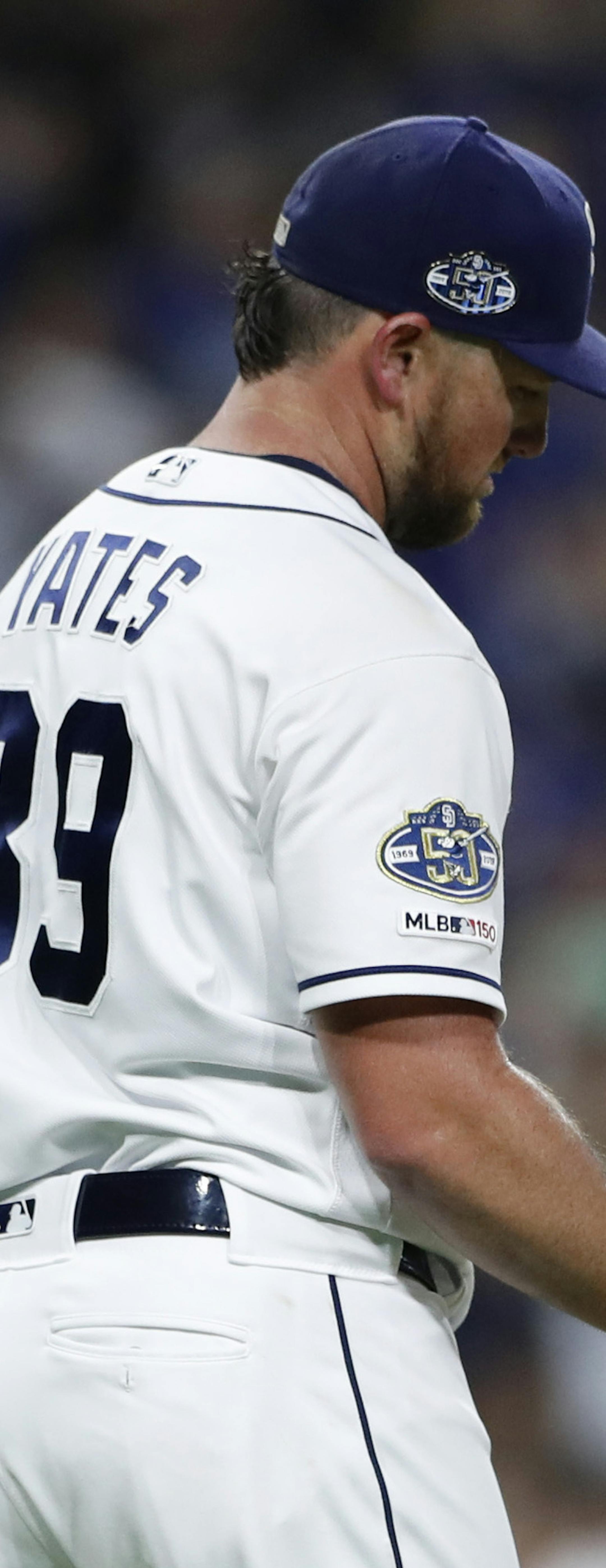 San Diego Padres relief pitcher Kirby Yates reacts after walking Los Angeles Dodgers' Alex Verdugo with the bases loaded during the ninth inning of a baseball game Saturday, May 4, 2019, in San Diego. (AP Photo/Gregory Bull) ORG XMIT: CAGB116