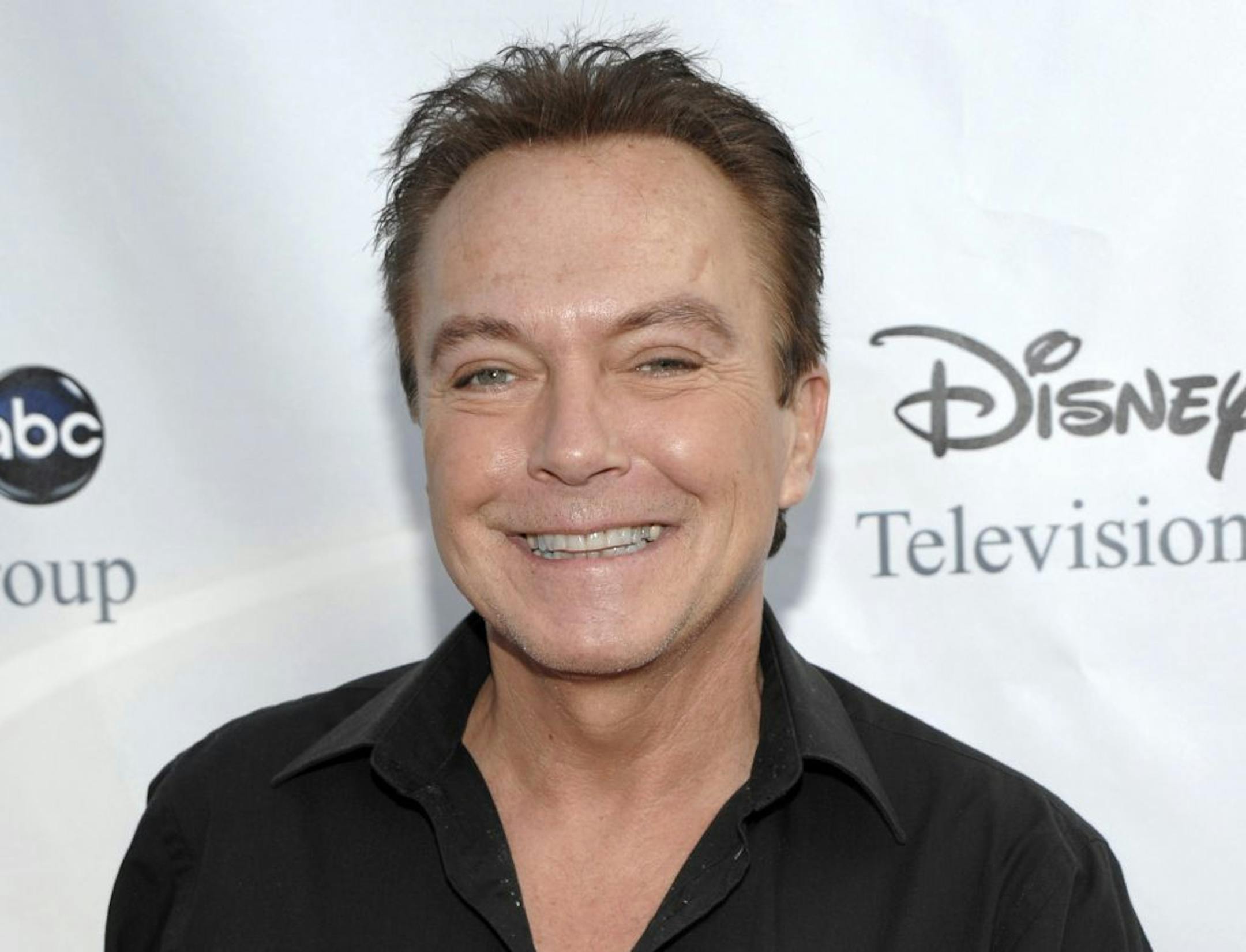 FILE - This Aug. 8, 2009 file photo shows actor-singer David Cassidy arriving at the ABC Disney Summer press tour party in Pasadena, Calif.