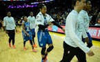 Minnesota Lynx players, including forward Maya Moore, walked back to the locker room following their 75-64 loss to the Los Angeles Sparks Friday night