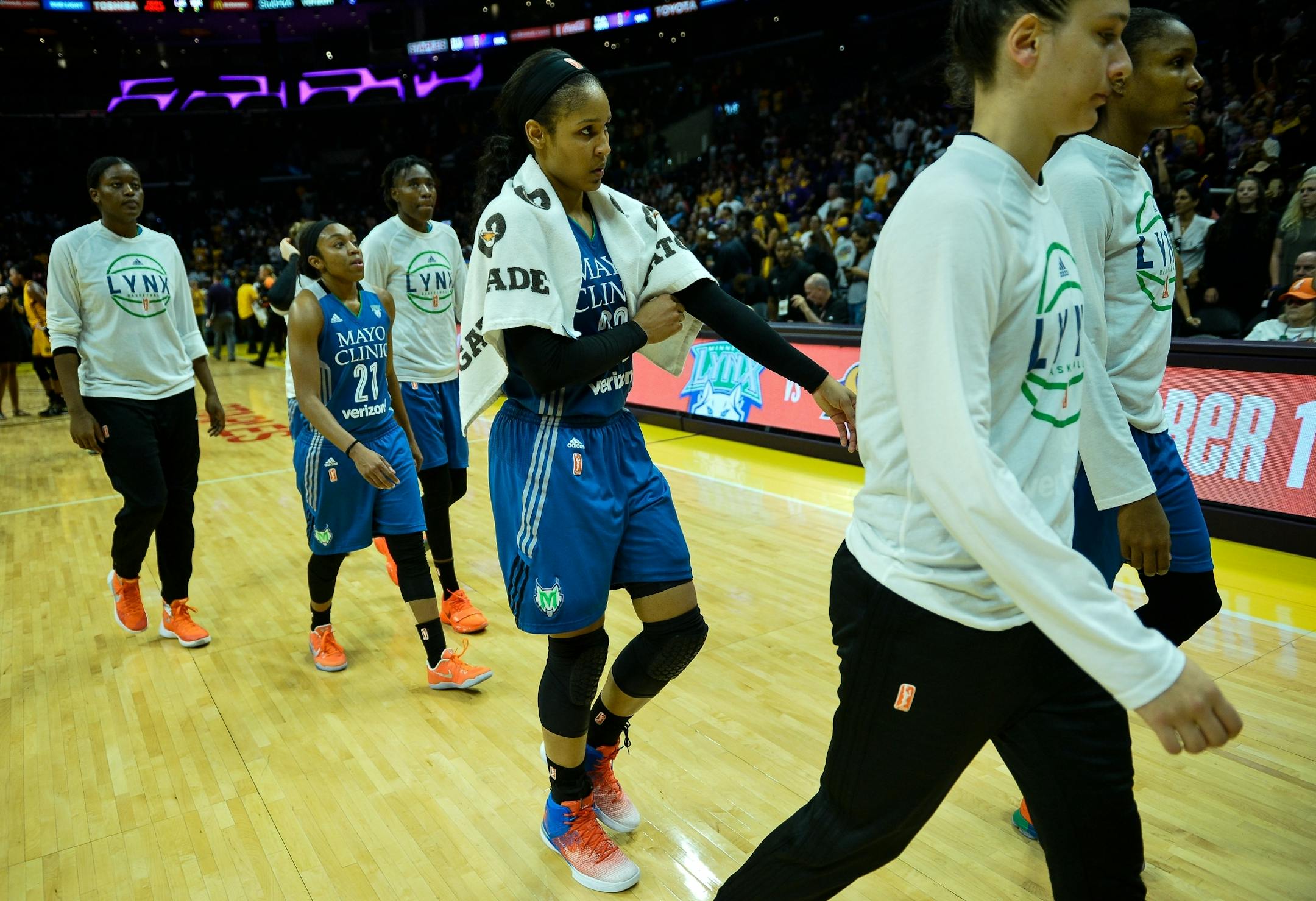 Minnesota Lynx players, including forward Maya Moore, walked back to the locker room following their 75-64 loss to the Los Angeles Sparks Friday night in game three of the WNBA Finals.