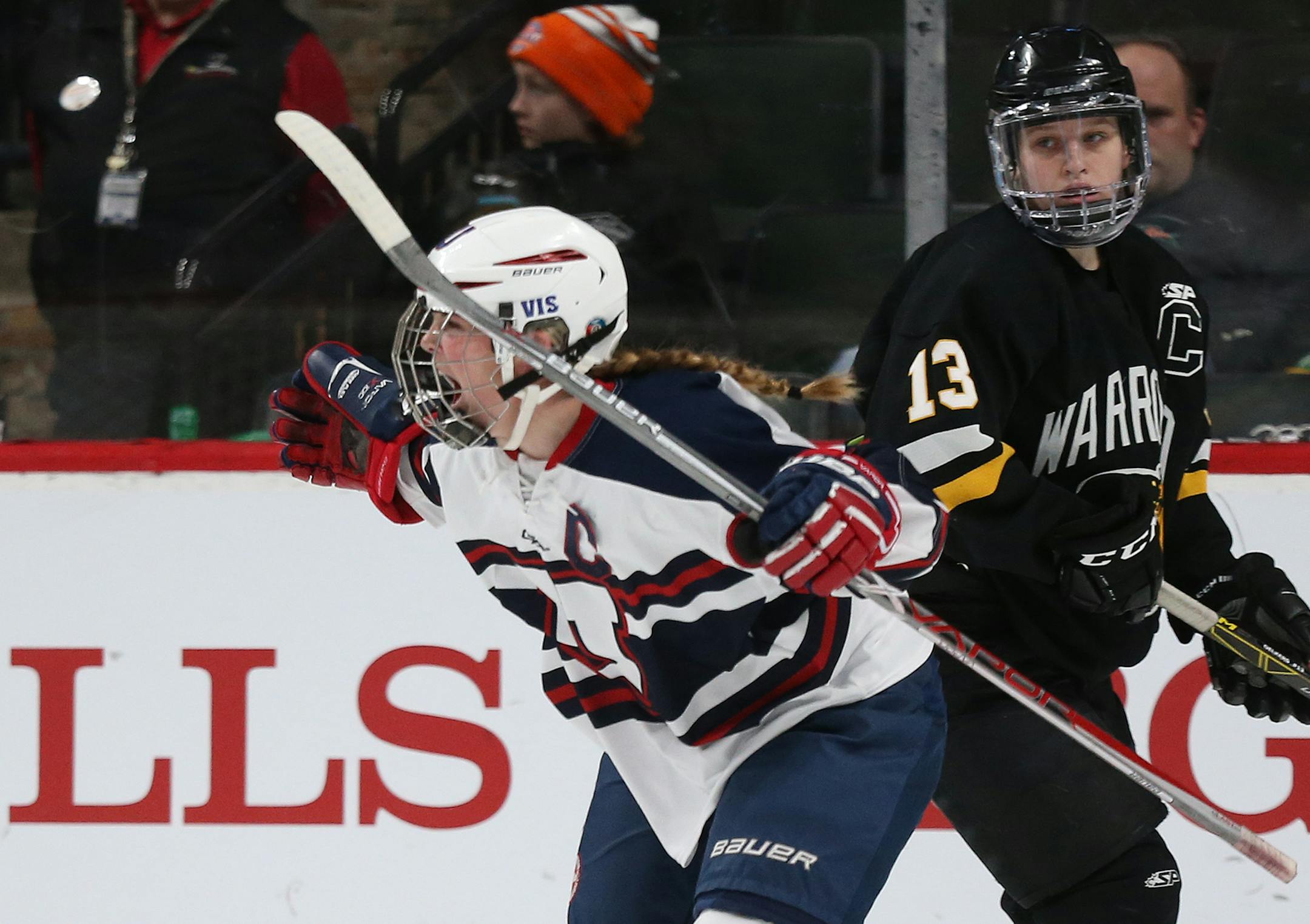 St. Paul United's Maggie Conners (9) celebrated after scoring her first goal of the game during the first period. ] (KYNDELL HARKNESS/STAR TRIBUNE) kyndell.harkness@startribune.com Girls' hockey state tournament. St. Paul United vs.Warroad Friday, Feb. 24, 2017 at the Xcel Energy Center in St. Paul, Min.
