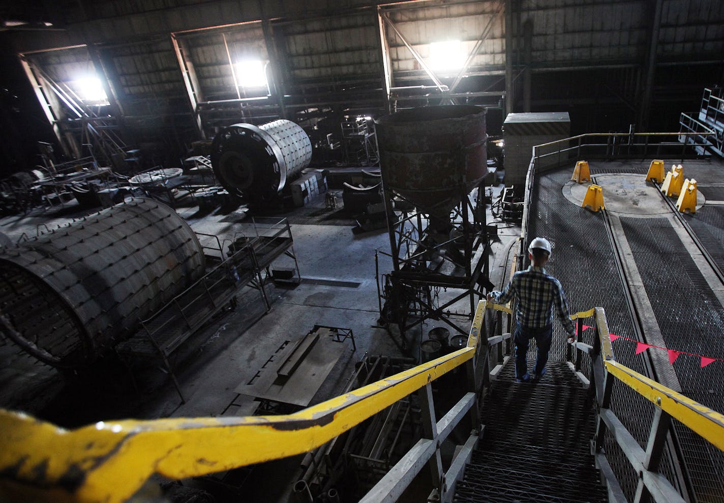 David Hughes of PolyMet walked through a closed plant back in 2011 that his company now wants to resurrect so it can process copper. The old taconite plant would be brought back to life when, and if, PolyMet gets a state permit to drill for copper and nickel.