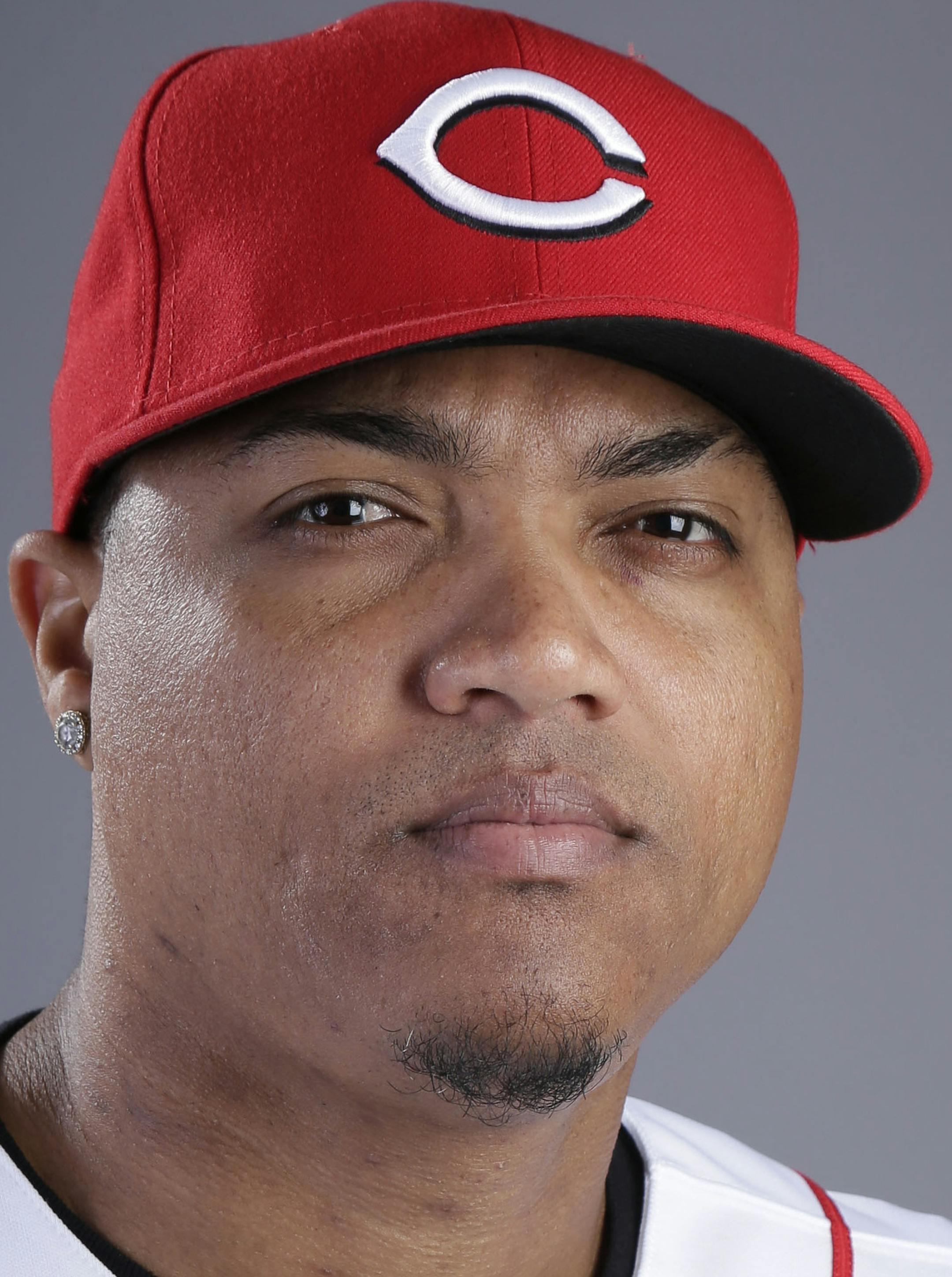 This is a 2014 photo of Alfredo Simon of the Cincinnati Reds baseball team. This image reflects the Reds active roster as of Thursday, Feb. 20, 2014, when this image was taken. (AP Photo/ Gregory Bull) ORG XMIT: AZGB101