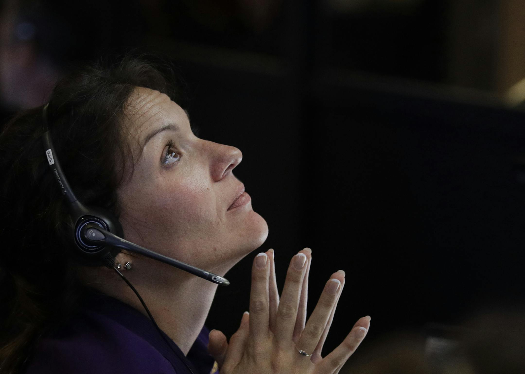 Engineer Mar Vaquero monitors the status of NASA's Cassini spacecraft as it enters the atmosphere of Saturn in mission control at NASA's Jet Propulsion Laboratory, Friday, Sept. 15, 2017, in Pasadena, Calif. Cassini disintegrated in the skies above Saturn early Friday, following a remarkable journey of 20 years. (AP Photo/Jae C. Hong, Pool)