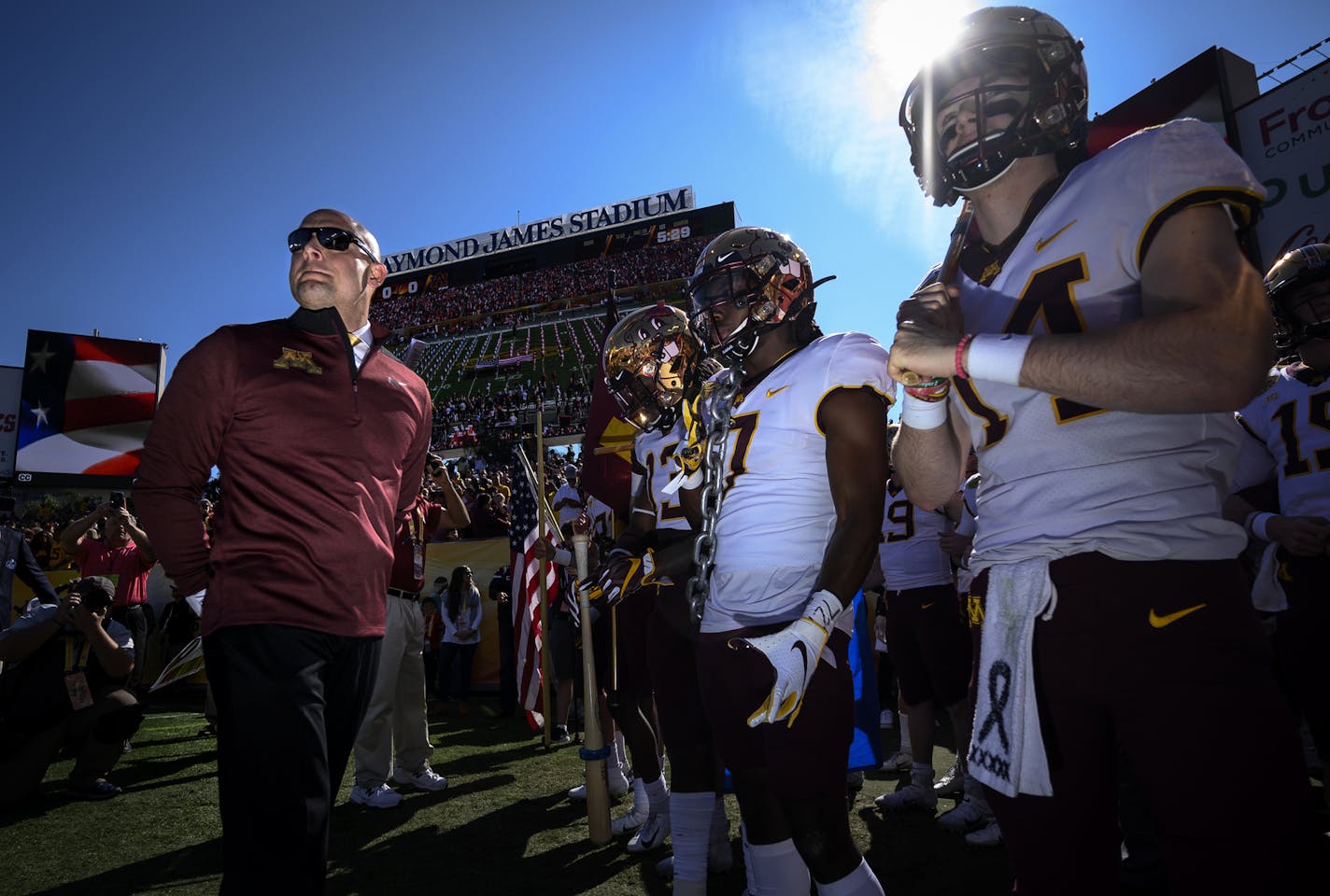 Minnesota Gophers head coach PJ Fleck lined up with his players before taking the field before Wednesday's game against the Auburn Tigers. ] Aaron Lavinsky &#x2022; aaron.lavinsky@startribune.com The Minnesota Gophers played the Auburn Tigers in the Outback Bowl on Wednesday, Jan. 1, 2020 at Raymond James Stadium in Tampa, Fla.