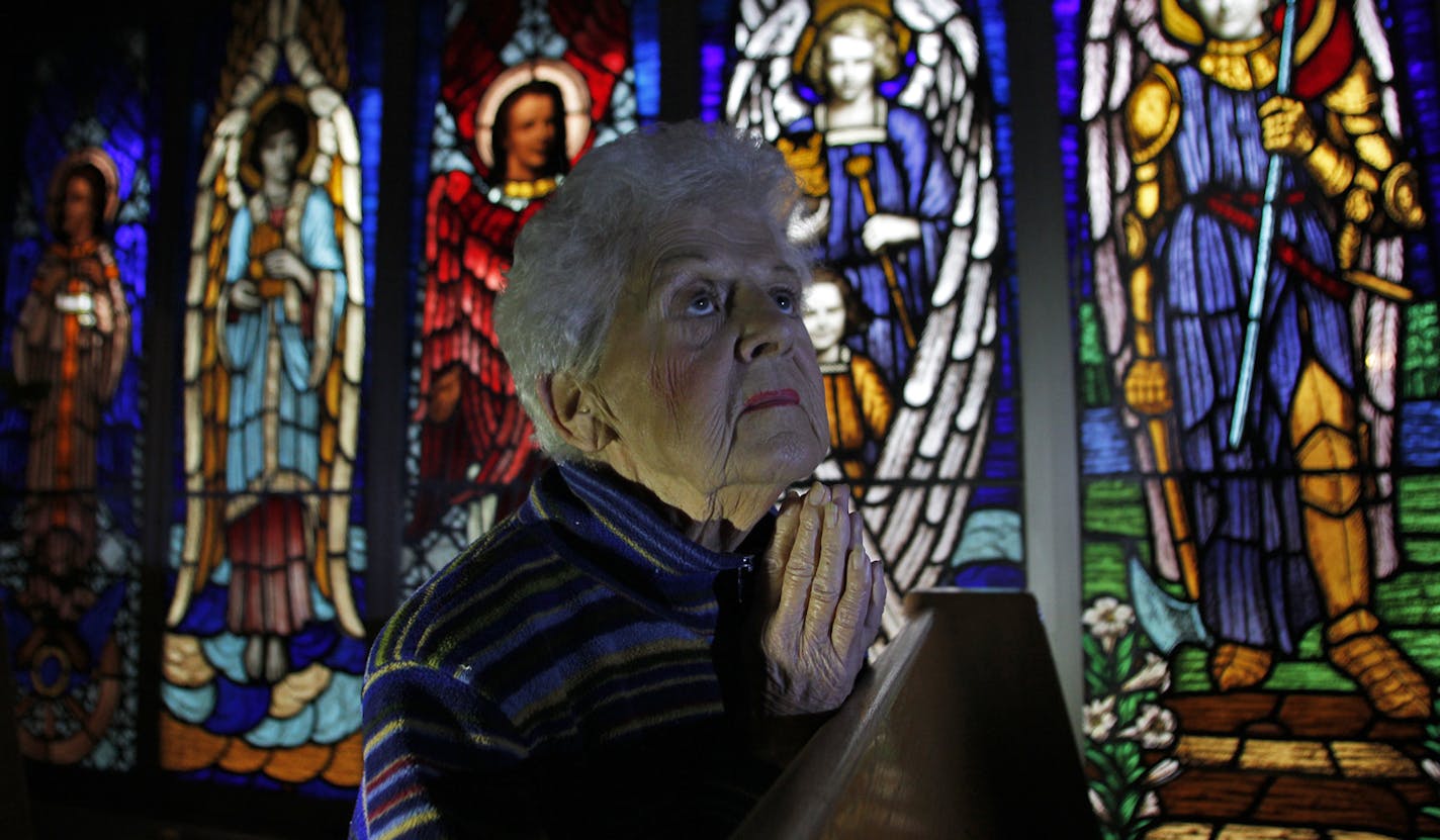 Jerie Greve, 81 of Minneapolis has prayed daily for the future of Saint Austin Catholic Church in north Minneapolis. The church is merging with Saint Bridget church - a move that Jerie Greve and her son Tom Greve oppose. Jerie Greve in the chapel of Saint Austin church. ](MARLIN LEVISON/STARTRIBUNE(mlevison@startribune.com (cq Jerie Greve, Tom Greve)