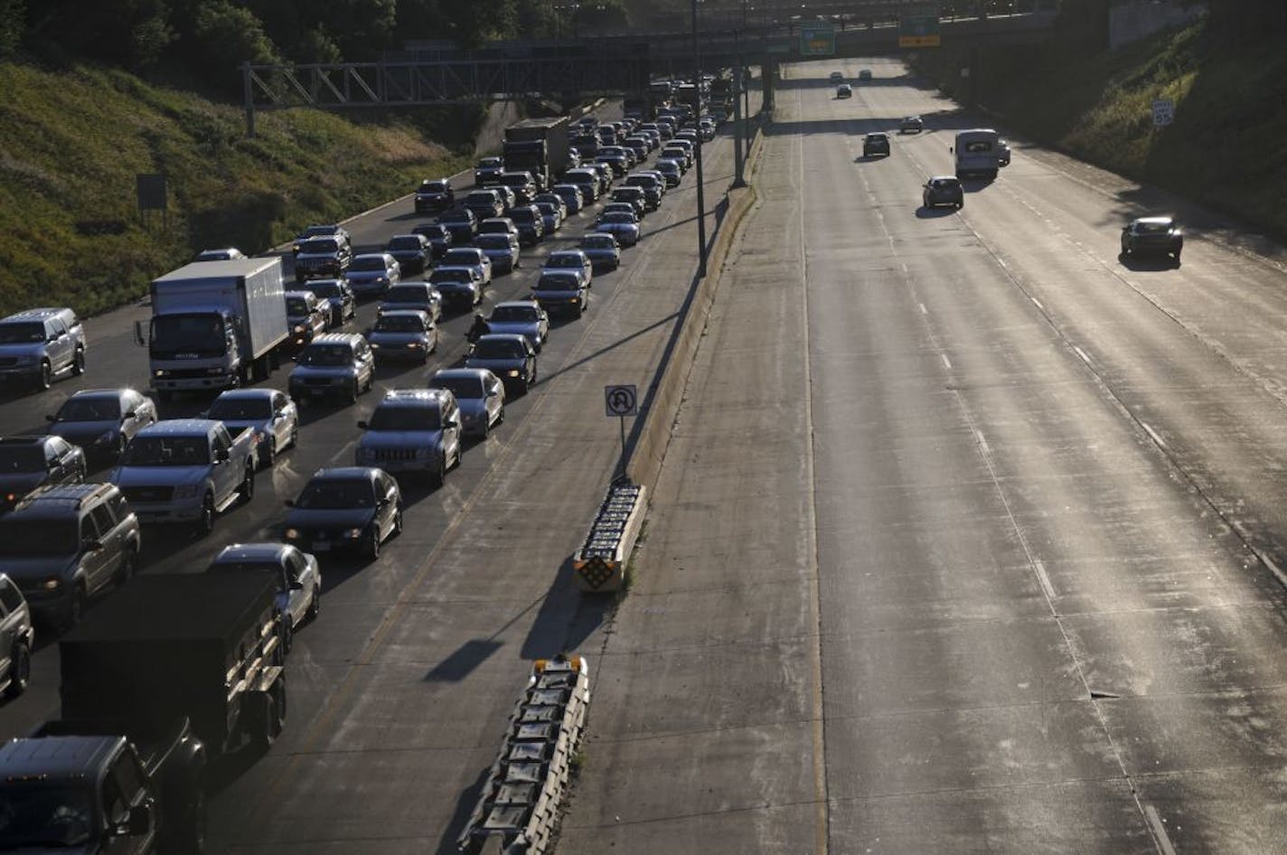 Westbound Interstate 94 traffic was at a standstill Wednesday morning after a semitrailer truck crashed in the Lowry Hill tunnel. Lanes in both directions were closed.