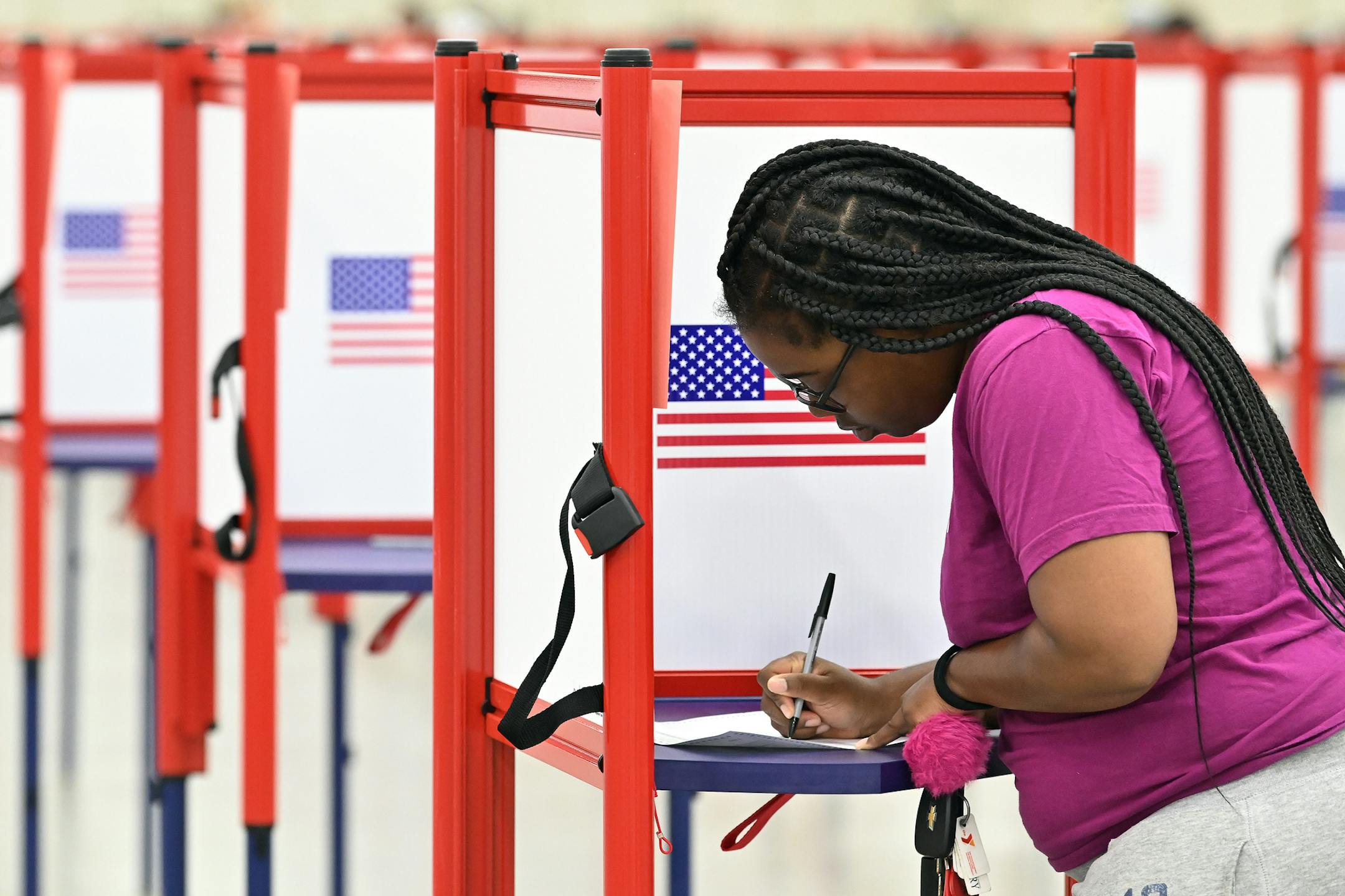 A voter fills out her ballot during the Kentucky Primary at the Kentucky Exposition Center in Louisville, Ky., Tuesday, June 23, 2020. (AP Photo/Timothy D. Easley)