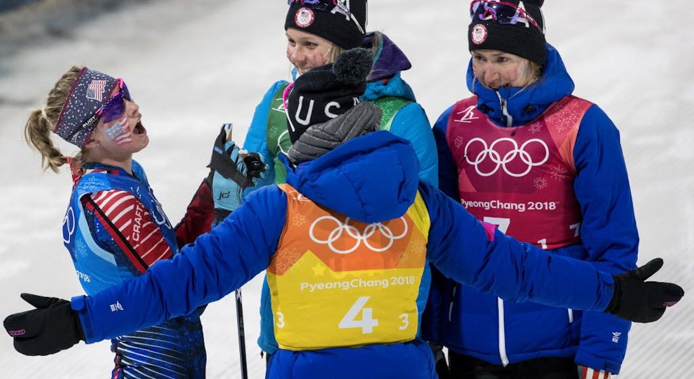 Jessie Diggins was greeted by teammates at the end of the Women's 4x5km Relay at Alpensia Cross-Country Centre. The USA finished in fifth place.