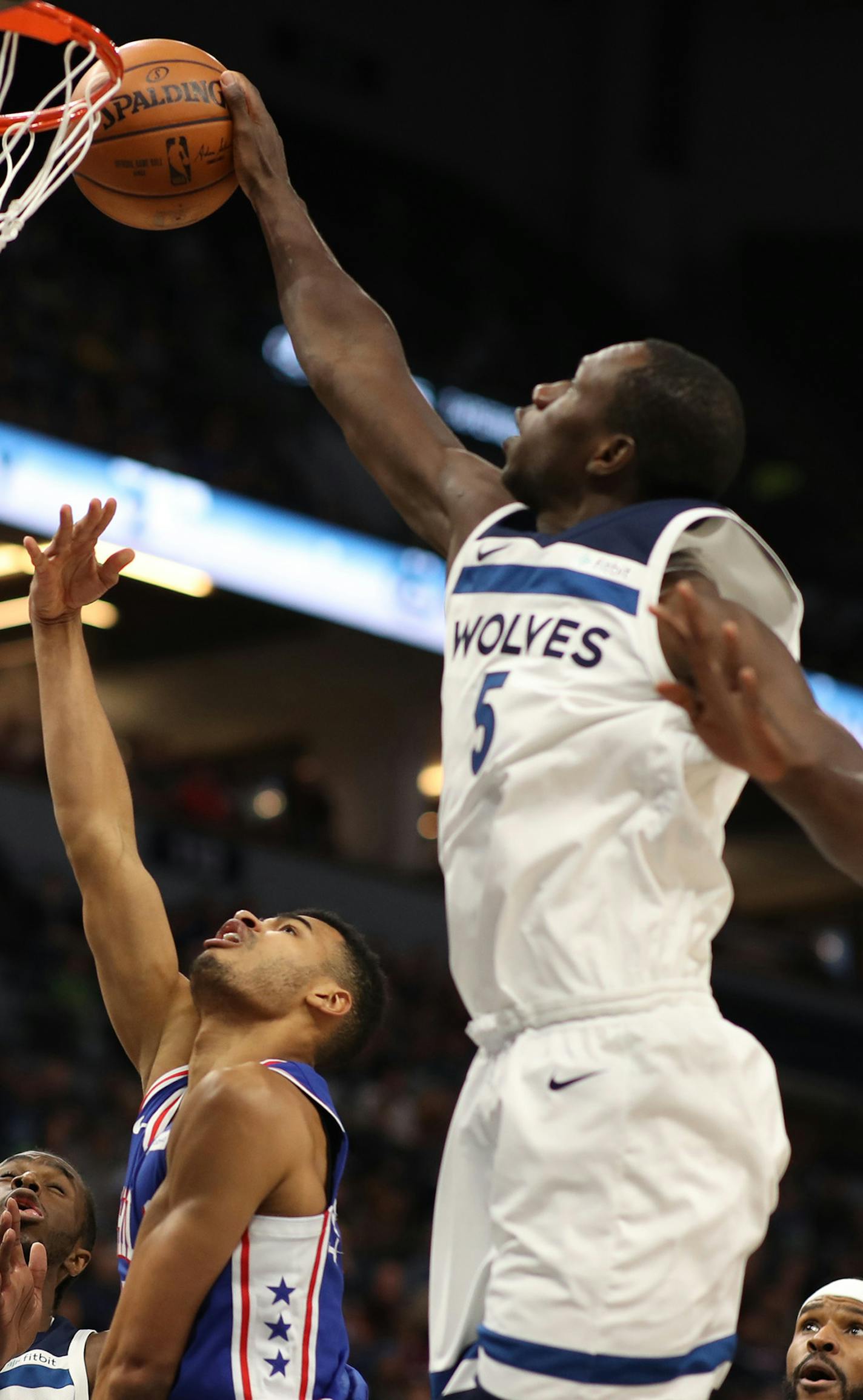 Minnesota Timberwolves center Gorgui Dieng (5) blocked the shot of Philadelphia 76ers guard Timothe Luwawu-Cabarrot (7) during NBA action at Target Center Tuesday December 12, 2017 in Minneapolis, MN.] The Minnesota Timberwolves hosted the Philadelphia 76ers at Target Center. JERRY HOLT &#xef; jerry.holt@startribune.com