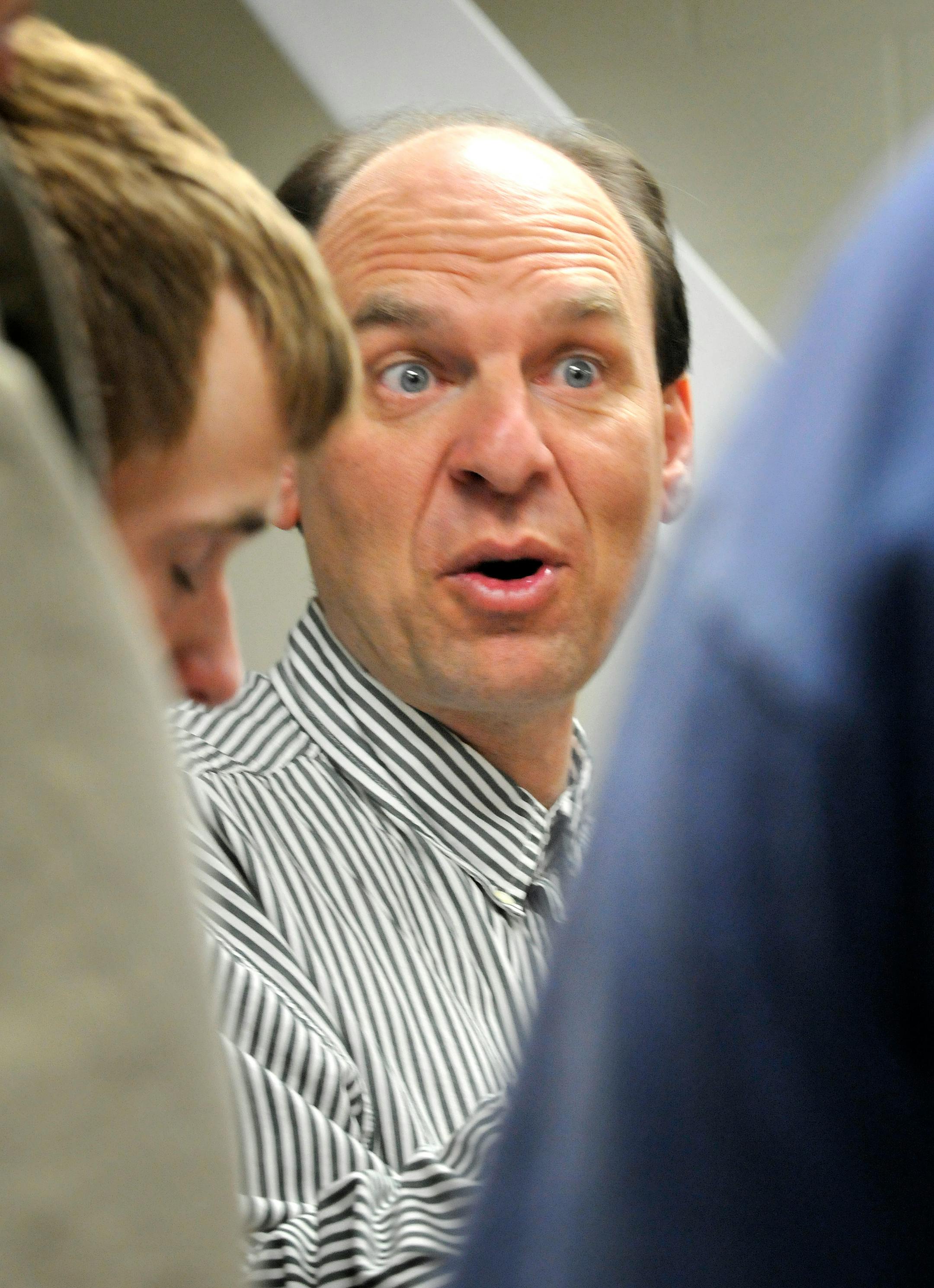 Tim Grubner coached students who would be presenting robots at a coming show. He said students can "program autonomous machines to do whatever you want."