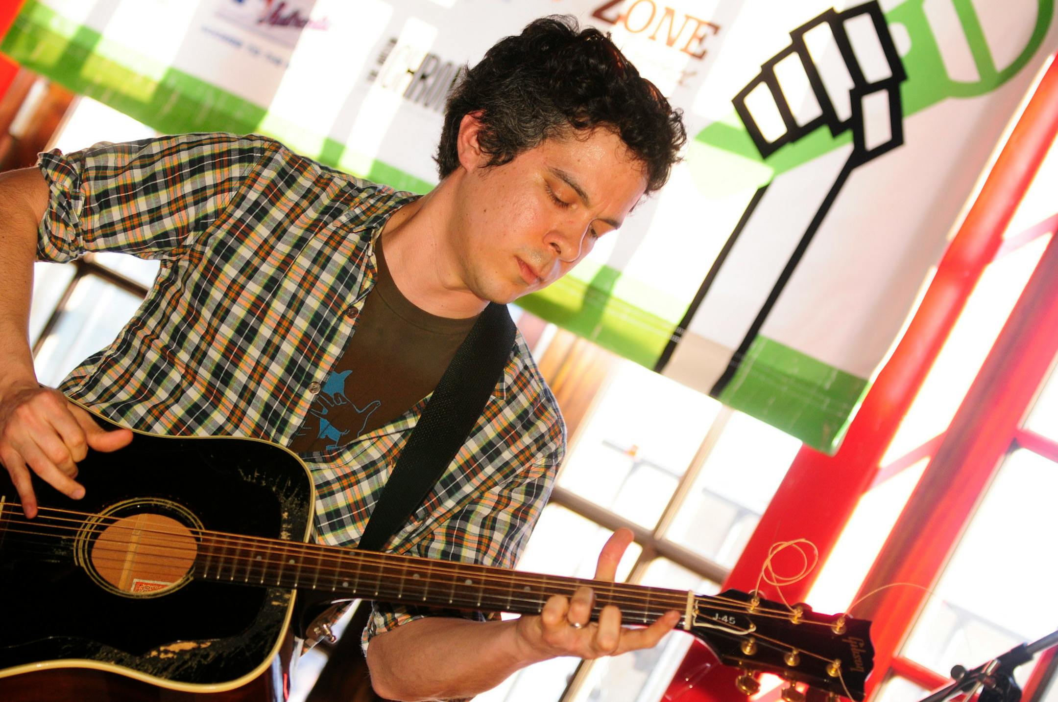 Courtney Kaiser, left, and Benjamin Cartel of Kaiser Cartel pose backstage at Threadgills at the South By Southwest music festival in Austin, Texas on March 18, 2009.