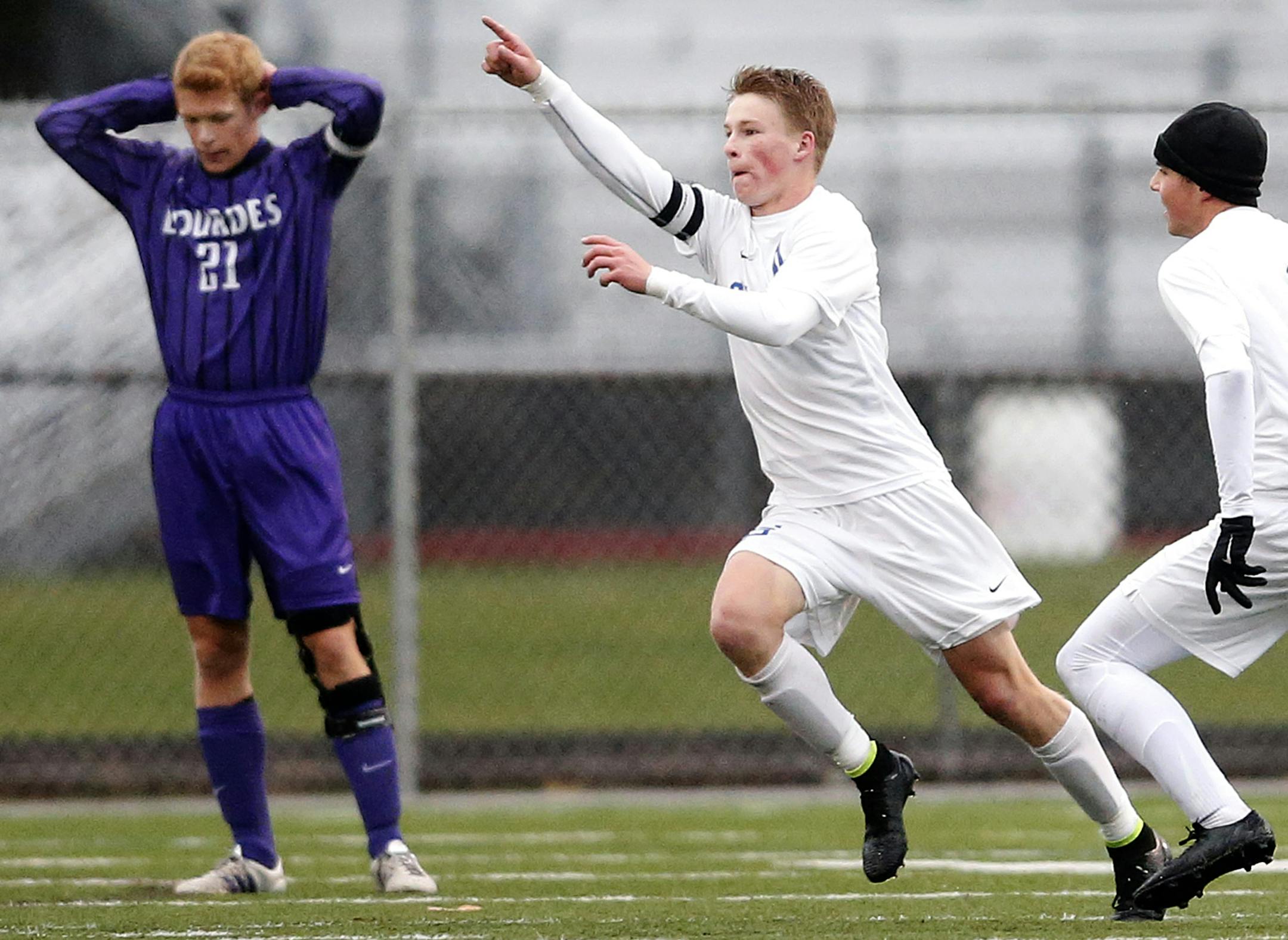Grant Dumler (11) of St. Thomas Academy celebrated after scoring a goal in the first half. ] CARLOS GONZALEZ ï cgonzalez@startribune.com - October 28, 2015, St Louis Park, MN, High School / Prep, Class 1A Boys soccer state, St. Thomas Academy v. Lourdes