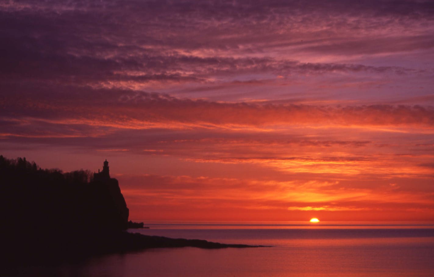 The sun rises on Lake Superior in autumn, 2006.