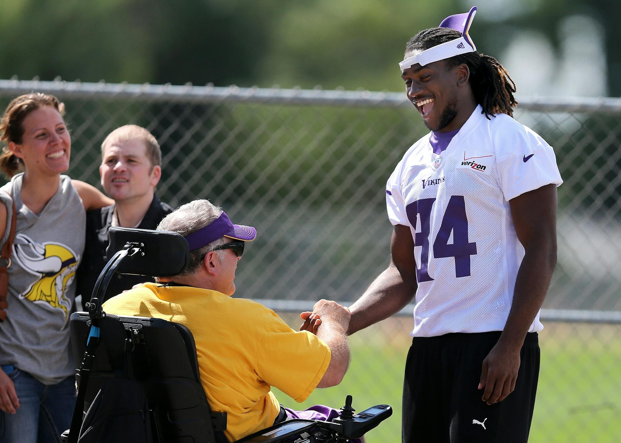Minnesota Vikings Cordarrelle Patterson greeted fans after the morning session of drills at the Vikings training camp at the University of Mankato, Monday, August 12, 2013.(ELIZABETH FLORES/STAR TRIBUNE) ELIZABETH FLORES � eflores@startribune.com
