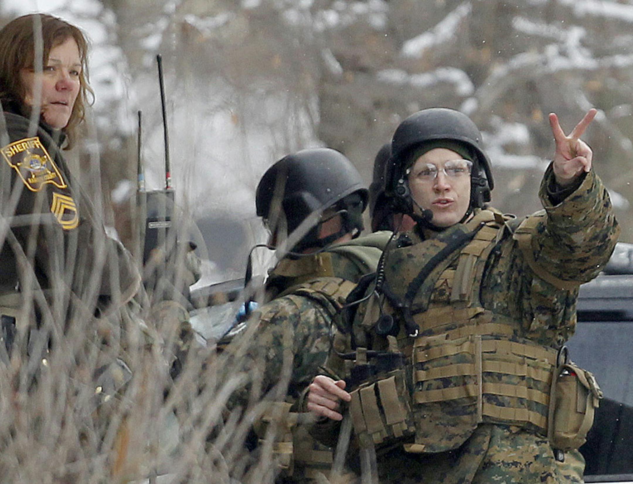 Maplewood police, swat team and medical personnel handled a standoff situationat 1863 County Road B, Monday, March 24, 2014 in Maplewood, MN. ] (ELIZABETH FLORES/STAR TRIBUNE) ELIZABETH FLORES ‚Ä¢ eflores@startribune.com ORG XMIT: MIN1403241435140161