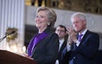 Former President Bill Clinton applauds as his wife, Democratic presidential candidate Hillary Clinton speaks in New York, Wednesday, Nov. 9, 2016. Cli