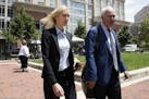Paul Manafort's former bookkeeper Heather Washkuhn, left, walks to the Alexandria Federal Courthouse in Alexandria, Va., Thursday, Aug. 2, 2018, to te