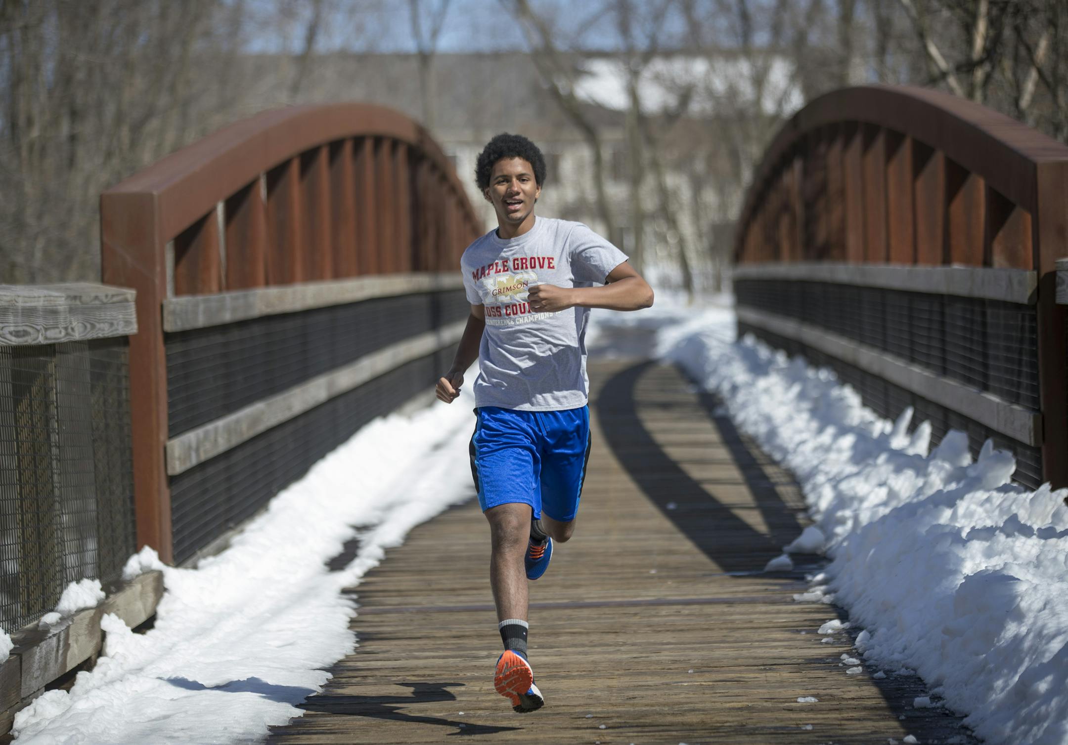 Maple Grove junior Sawyer French, who suffered a stroke last August, worked out last Thursday. Part of his skull was removed as part of his recovery.