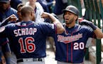 Eddie Rosario celebrated his solo home run with teammate Jonathan Schoop on May 23.