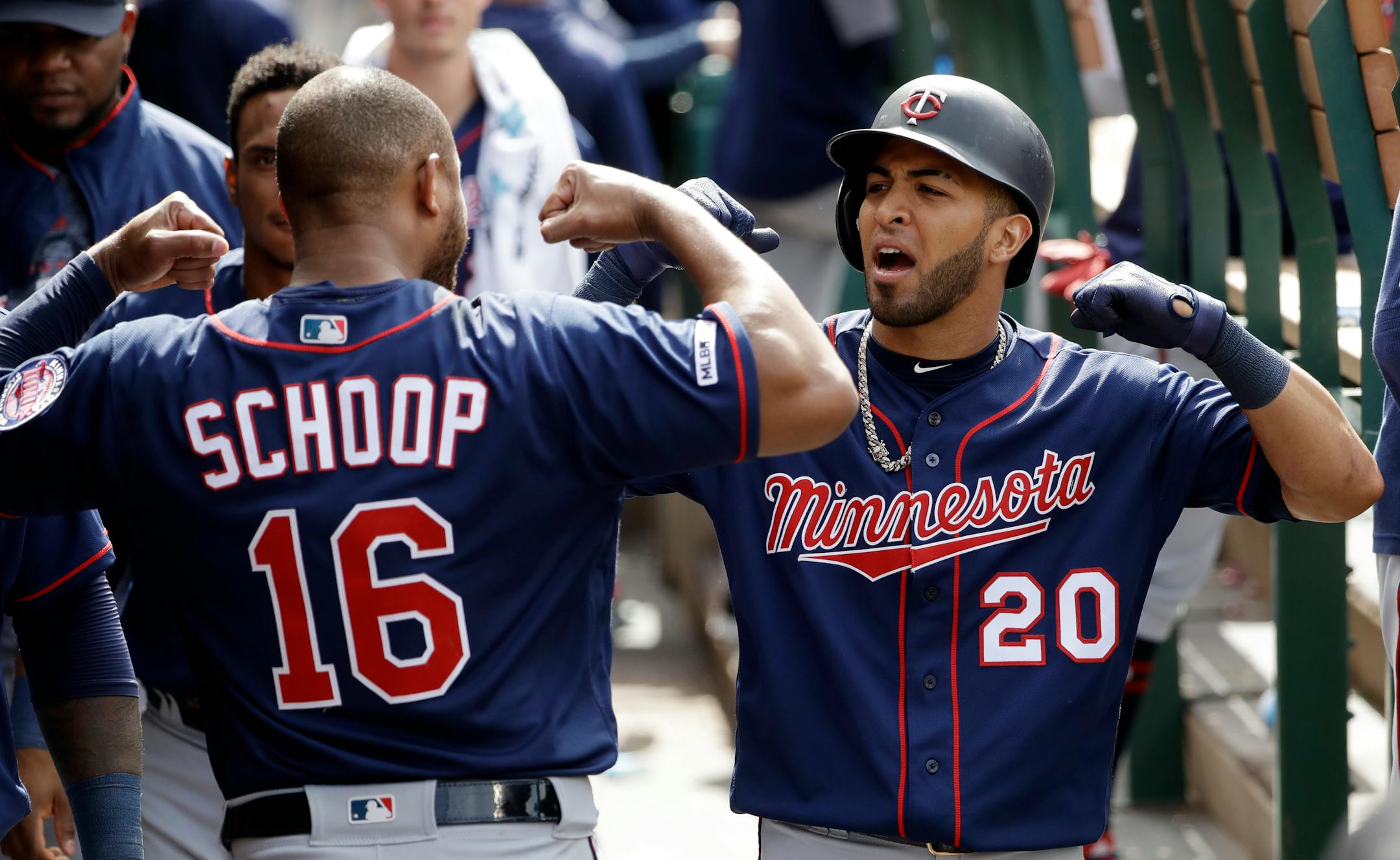 Eddie Rosario celebrated his solo home run with teammate Jonathan Schoop on May 23.