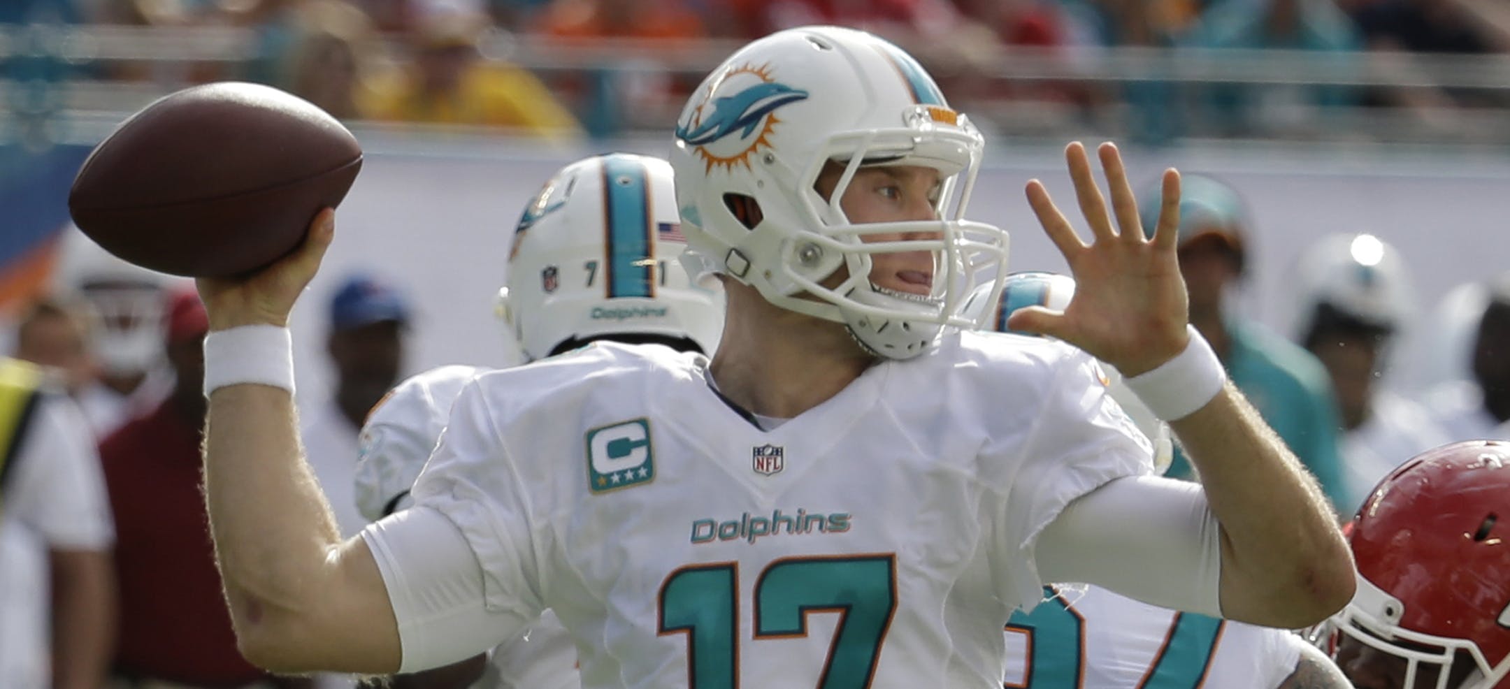 Miami Dolphins quarterback Ryan Tannehill (17) looks to pass during the first half of an NFL football game against the Kansas City Chiefs, Sunday, Sept. 21, 2014, in Miami Gardens, Fla. (AP Photo/Lynne Sladky)