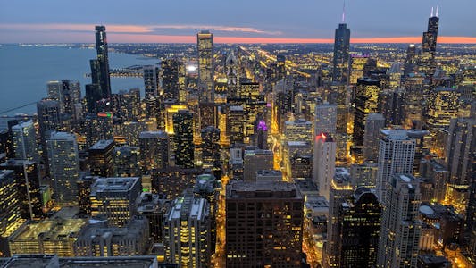The Chicago Skyline at dusk, as seen from the former Signature Room Lounge on the 95th floor of the John Hancock Building in 2019.