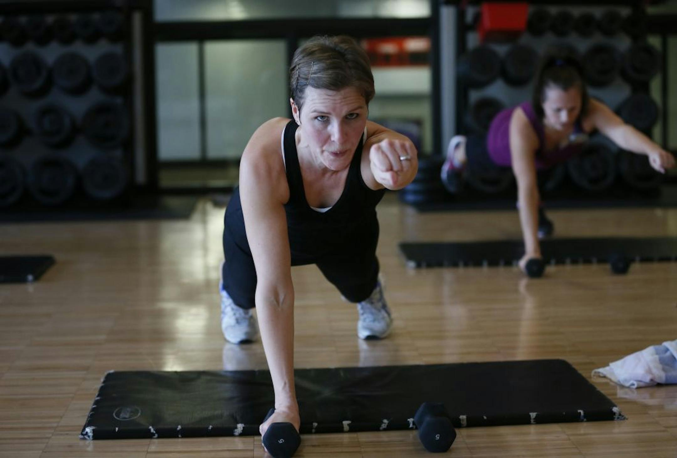 Michelle Solberg works out in a Tabata class at the Andover YMCA.