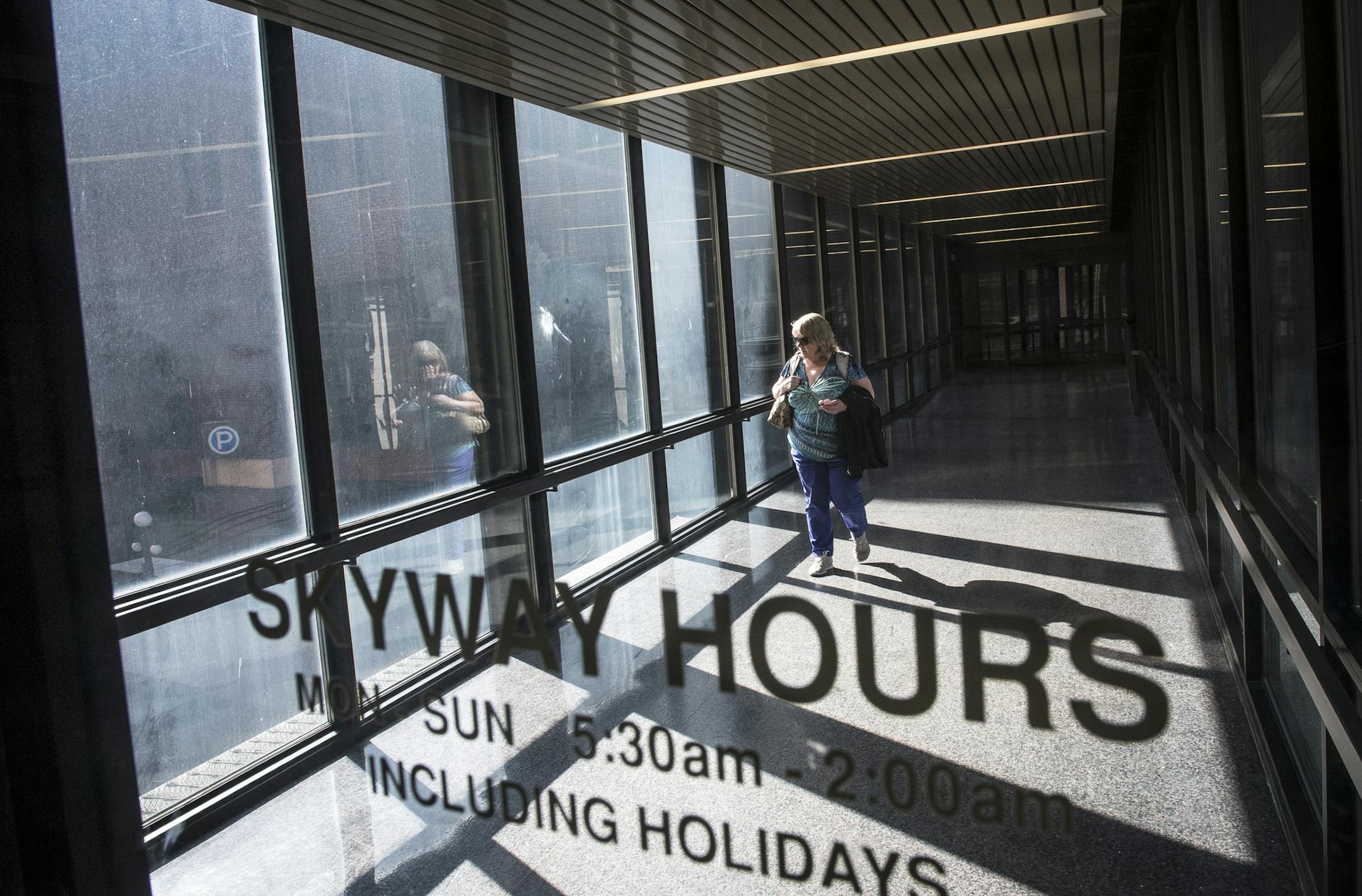 Vicky Johnson, of Stacy, Minn., walked through the skyway attached to 180 East Fifth Street in downtown St. Paul Thursday night as she left her job at the Department of Public Safety. "I've noticed since the union depot opened and the buses are down there now and it's open 24 hours a day, there's a lot more panhandling now." said Johnson. "I'm aware of my surroundings a little more than I would be." ] (AARON LAVINSKY/STAR TRIBUNE) aaron.lavinsky@startribune.com St. Paul's skyways have become a p