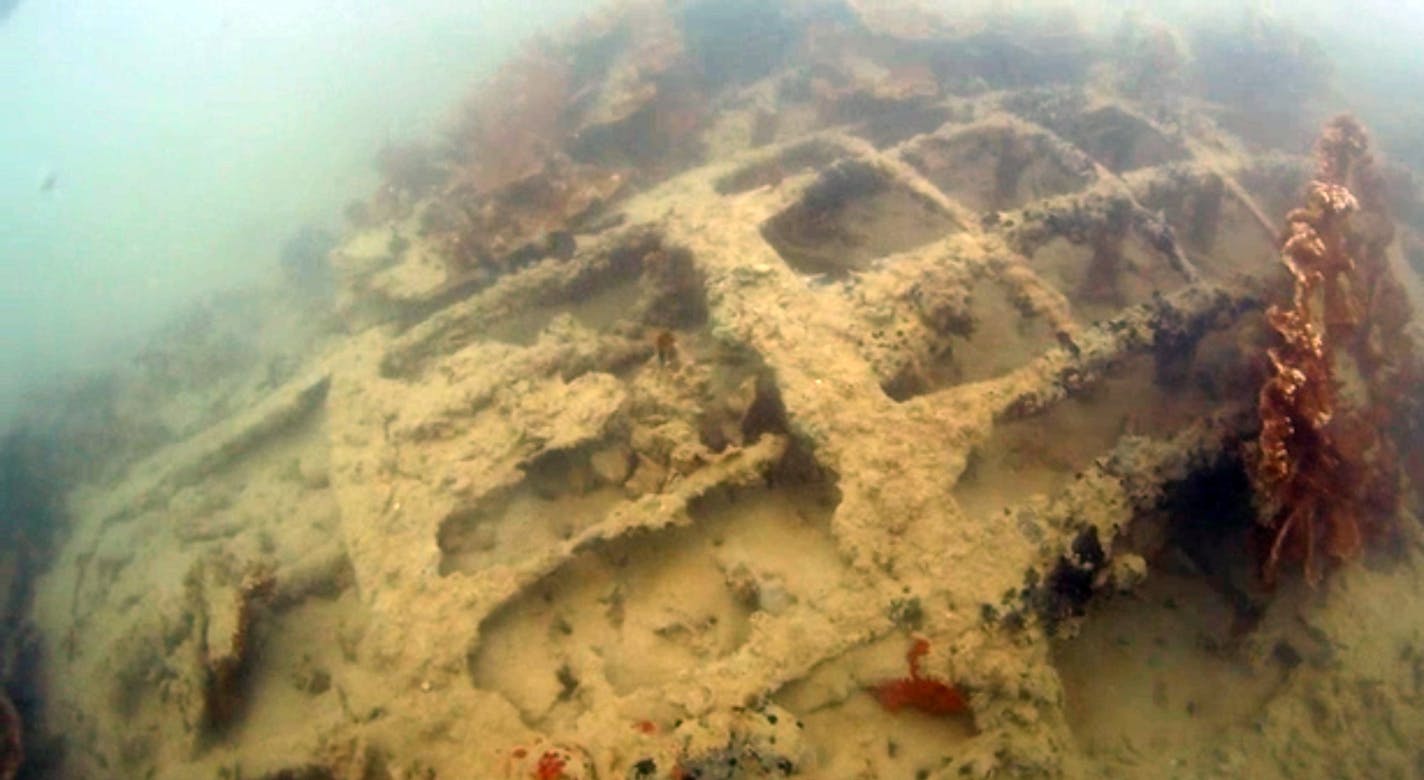 In this June 12, 2015 image taken from video provided by NOAA, a U.S. Navy seaplane that sank in Hawaii waters during the Japanese attack on Pearl Harbor is shown. New images of the plane are the clearest taken of the Catalina PBY-5 to date, Hans Van Tilburg, a maritime archaeologist with the Office of National Marine Sanctuaries, says. (NOAA Office of National Marine Sanctuaries via AP)