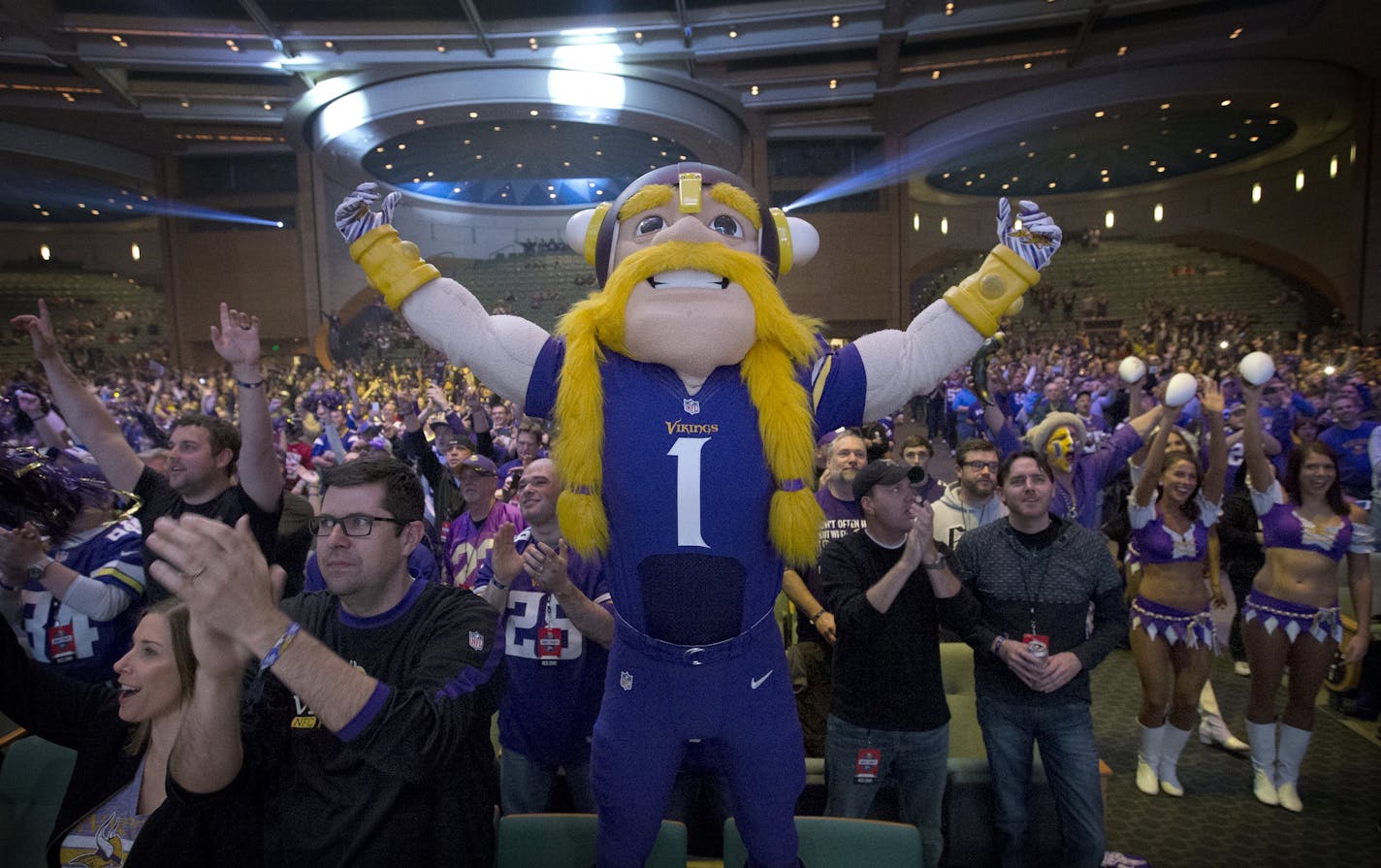 Viktor Viking and fans during the Minnesota Vikings Draft Party.