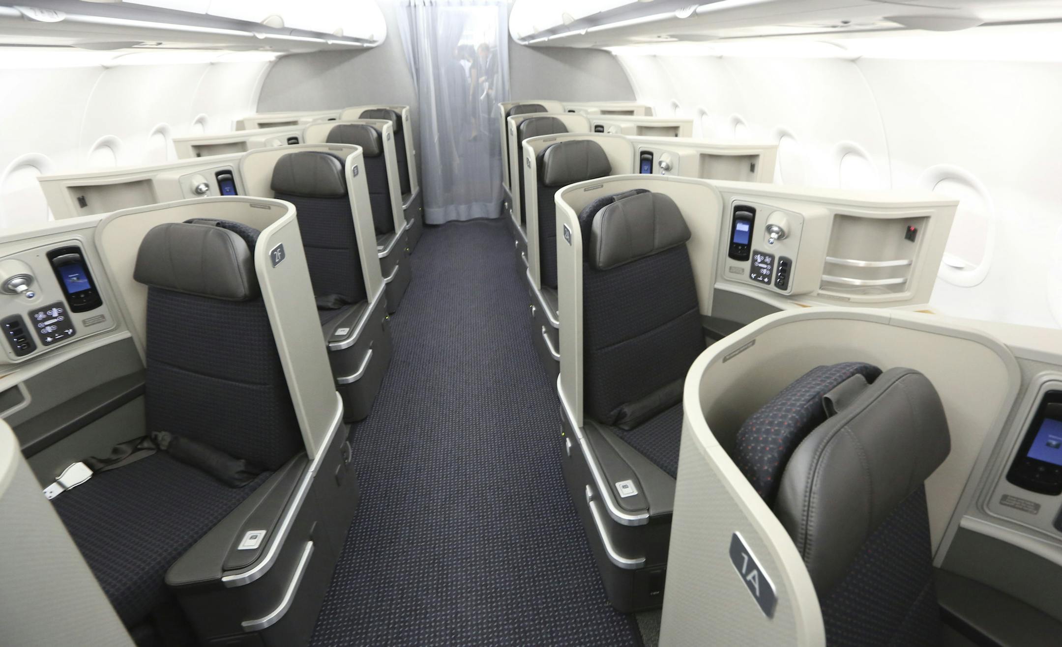 The first-class interior of a new jet was displayed last month at the American Airlines operations center near Dallas. Airlines are on the largest jet-buying spree in the history of civil aviation.