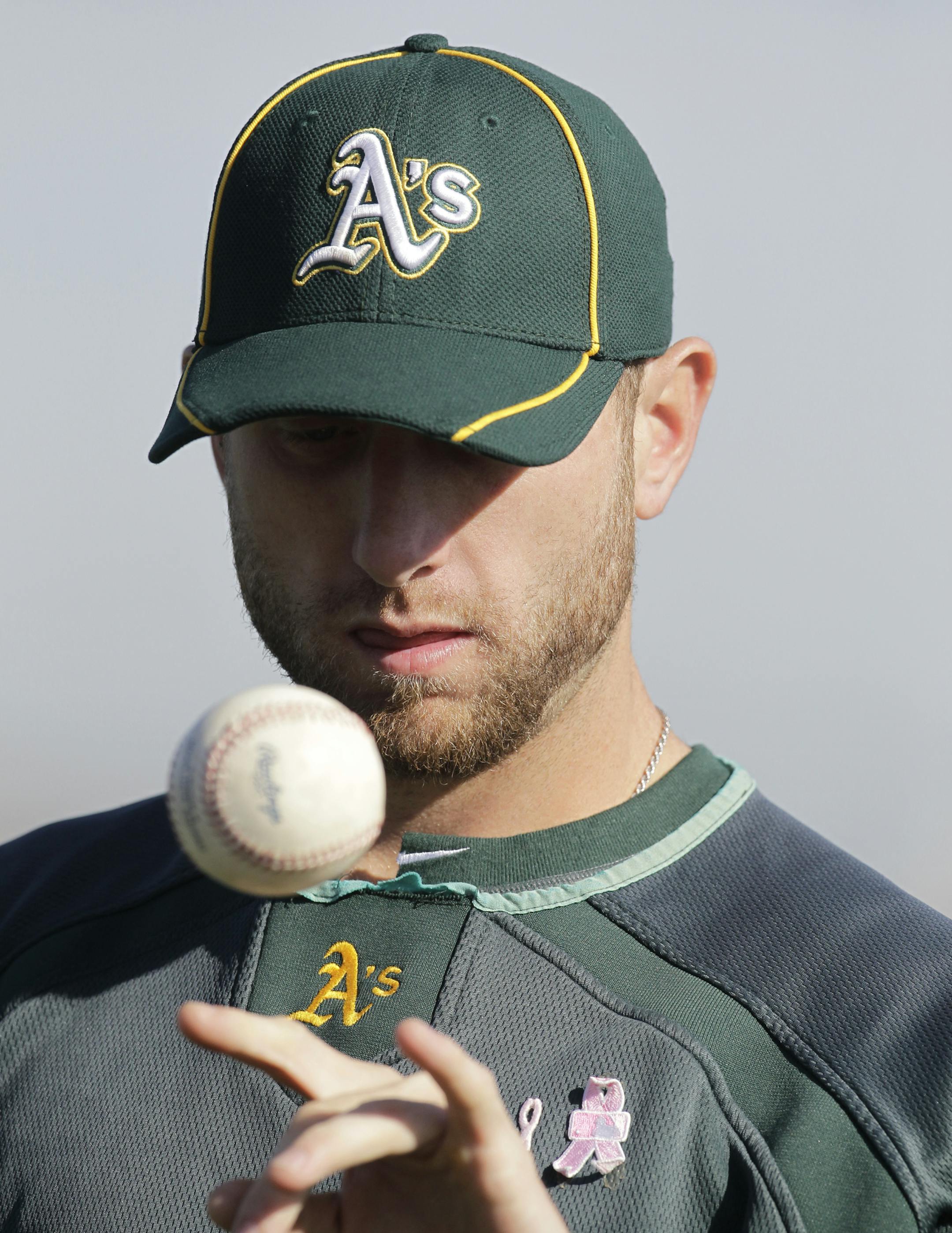 Oakland Athletics' Dallas Braden during a spring training baseball workout Tuesday, Feb. 21, 2012, in Phoenix. (AP Photo/Darron Cummings) ORG XMIT: NYOTK