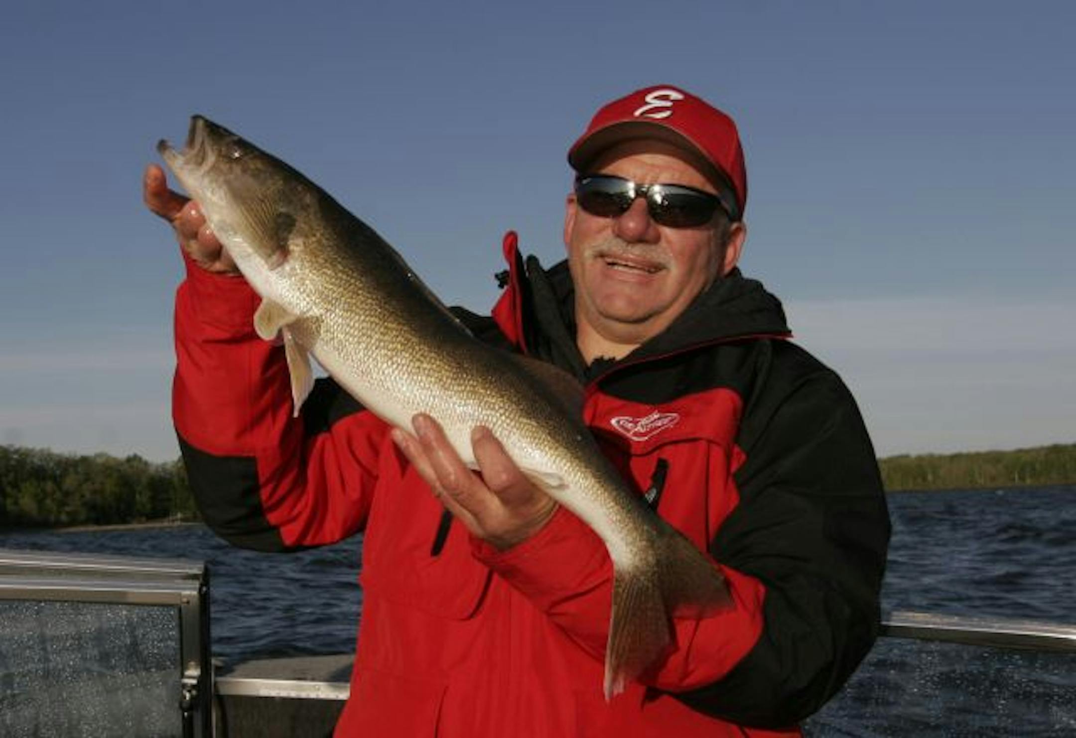Doug Smith/Star Tribune; May 30, 2009;Jack Rendulich of Duluth holds a 26 1/4-inch walleye he caught last weekend on Leech Lake. Walleye fishing on the big lake has bounced back after years of decline.